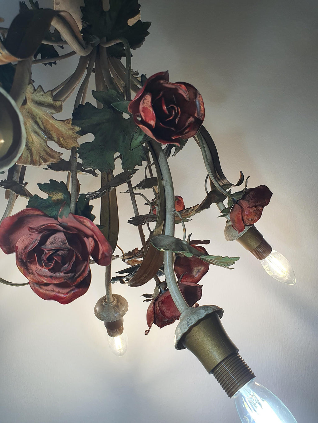 Vintage Italian tole chandelier — green leaves and gold painted details, side profile