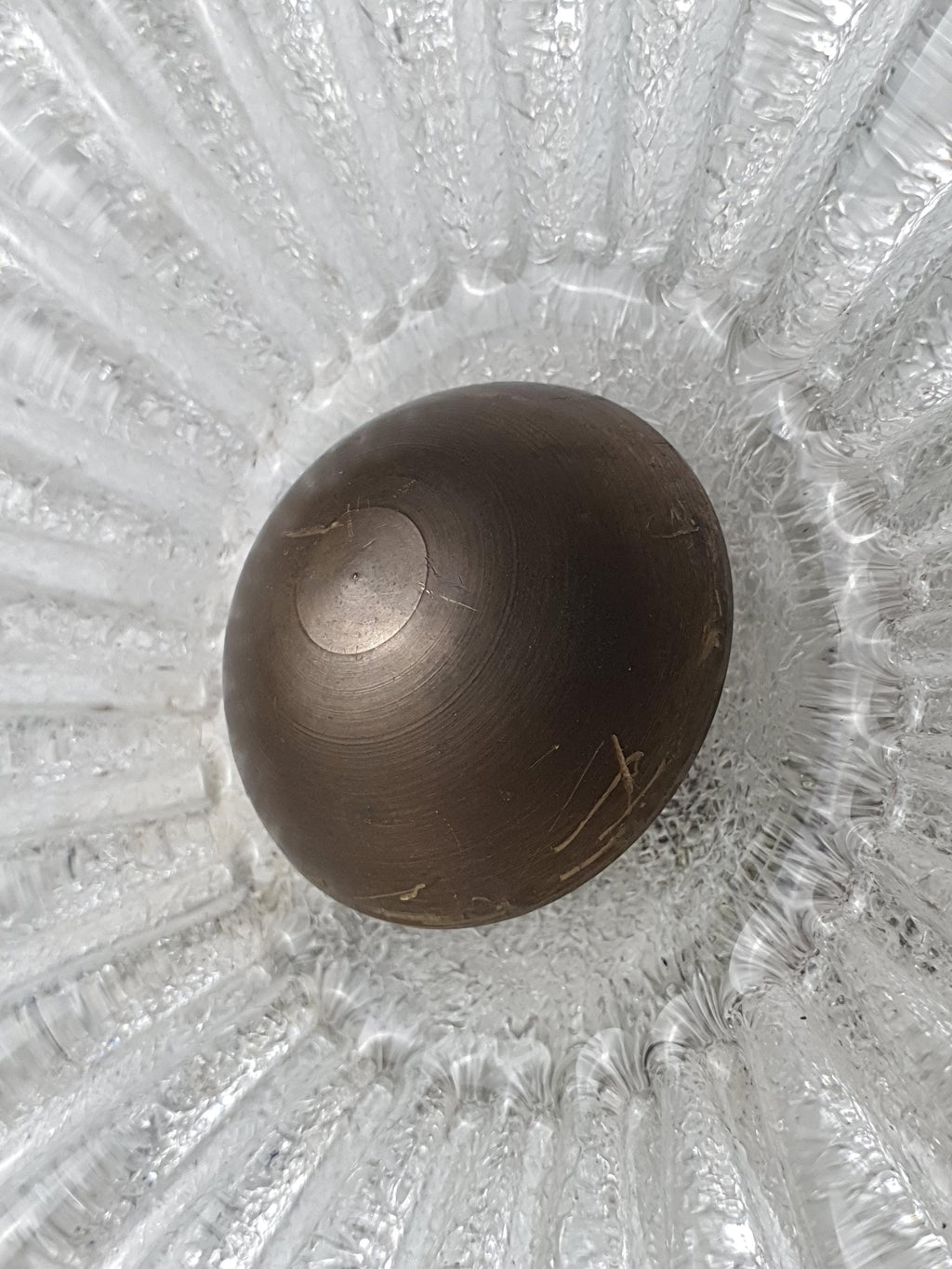 Vintage Venetian shell flush mount unlit, showing shell silhouette, ribbed relief, and dual-finish glass texture