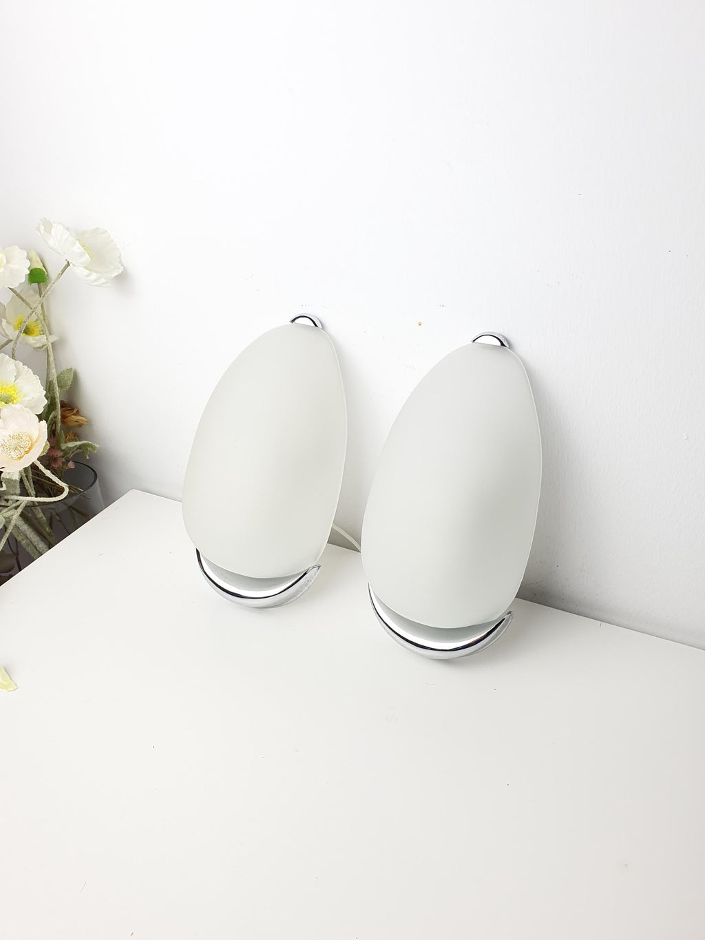 Chrome base detail of vintage Italian egg-form wall sconce, rewired, MCM Scandinavian minimalist, 1960s–1970s