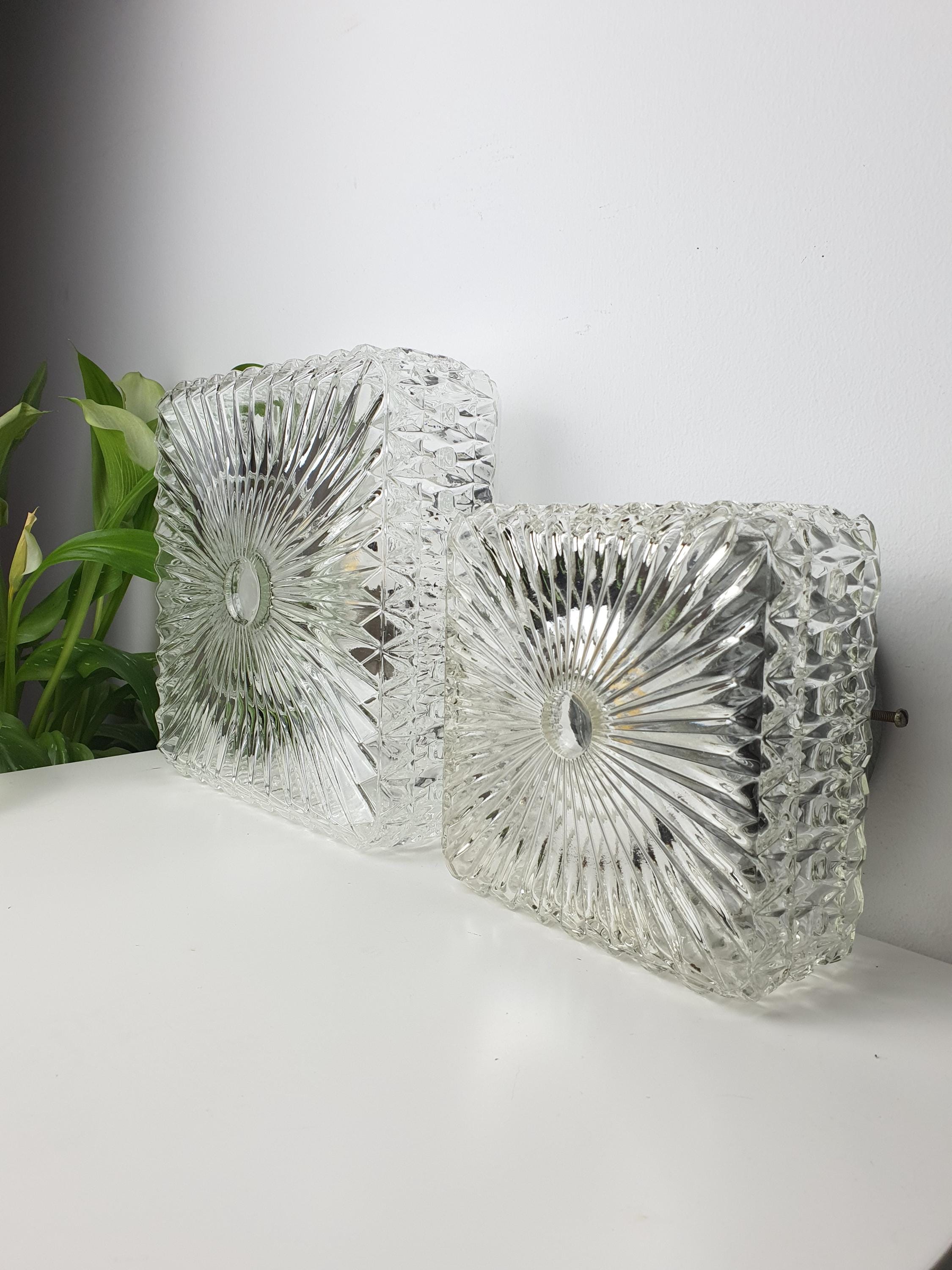 Set of 2 Brutalist MCM Midcentury wall sconces in stamped clear glass