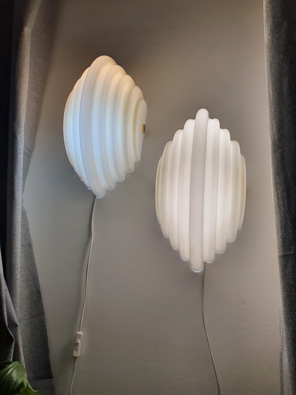 Kazuhide Takahama Kumo 2 wall sconce — smooth acrylic surface and diffused glow