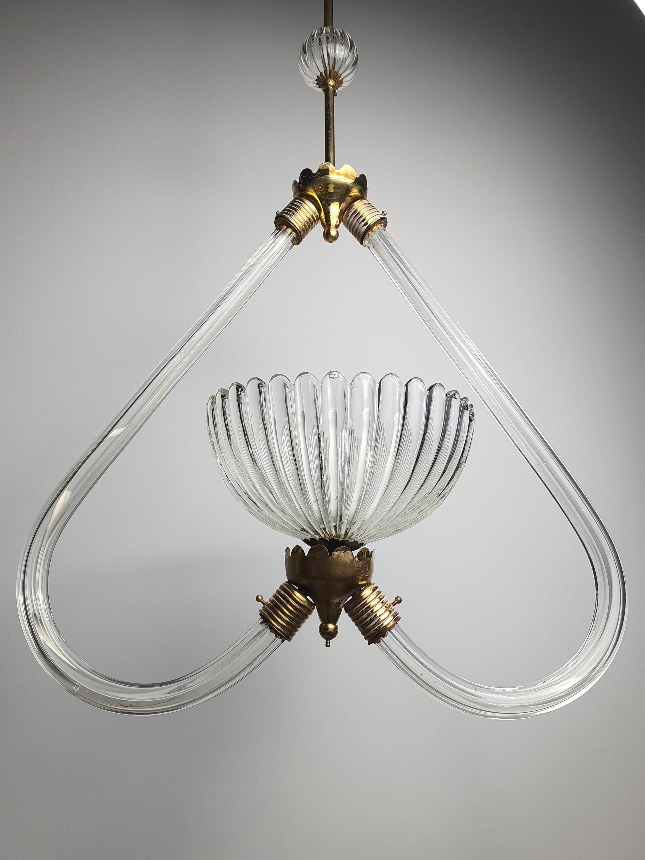 Murano glass heart-form pendant — clear glass translucency and sculptural bowl shape