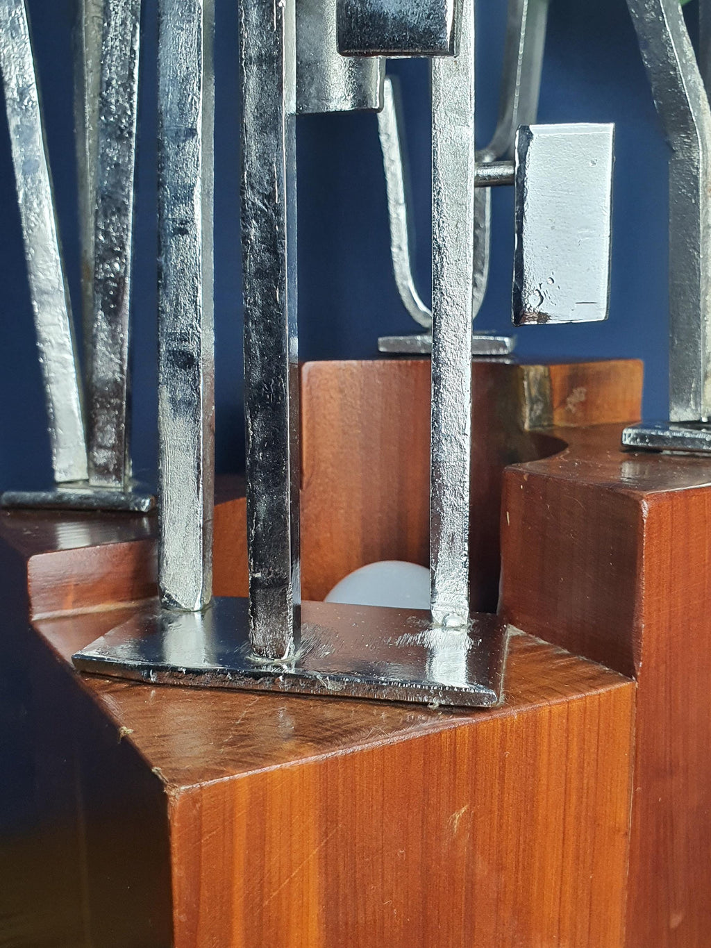 Detail of textured aluminium tree elements and wood cube base contrast, signed Carlo Brutalist lamp, 1970s
