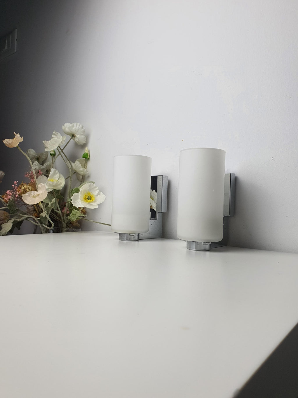 Vintage INDA Divo sconce — soft uniform glow through satin glass, illuminated