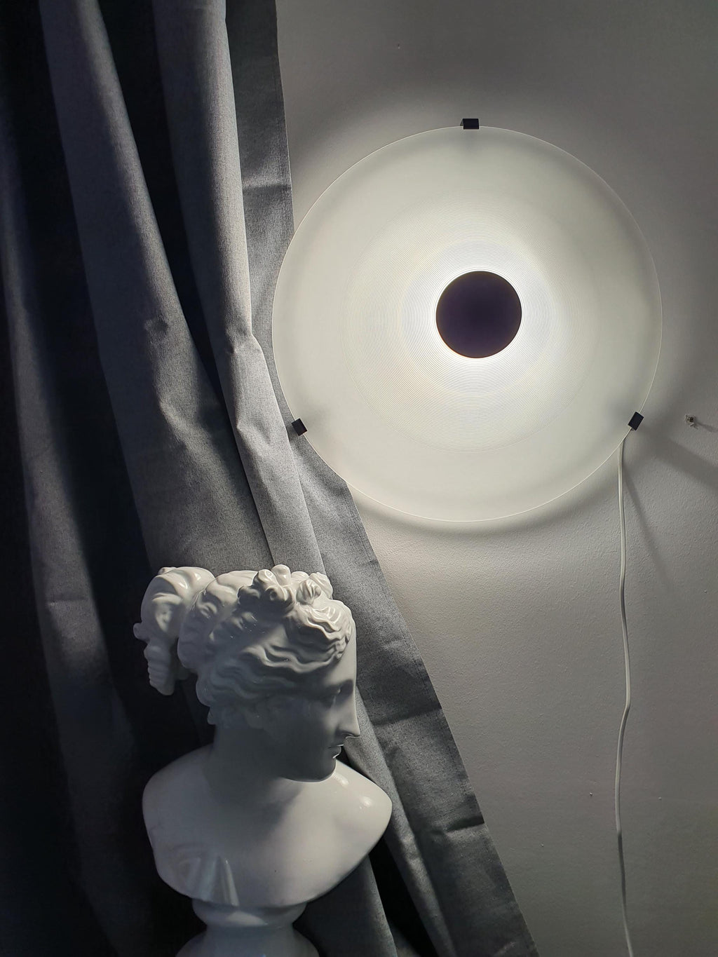 F. Fabbian vintage Italian Memphis pyramid light — frosted glass and black metal, front view