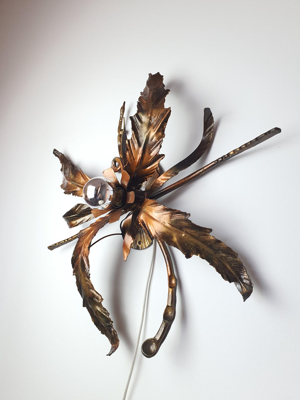 Vintage metal wall or ceiling light with a stylised branch-inspired design
