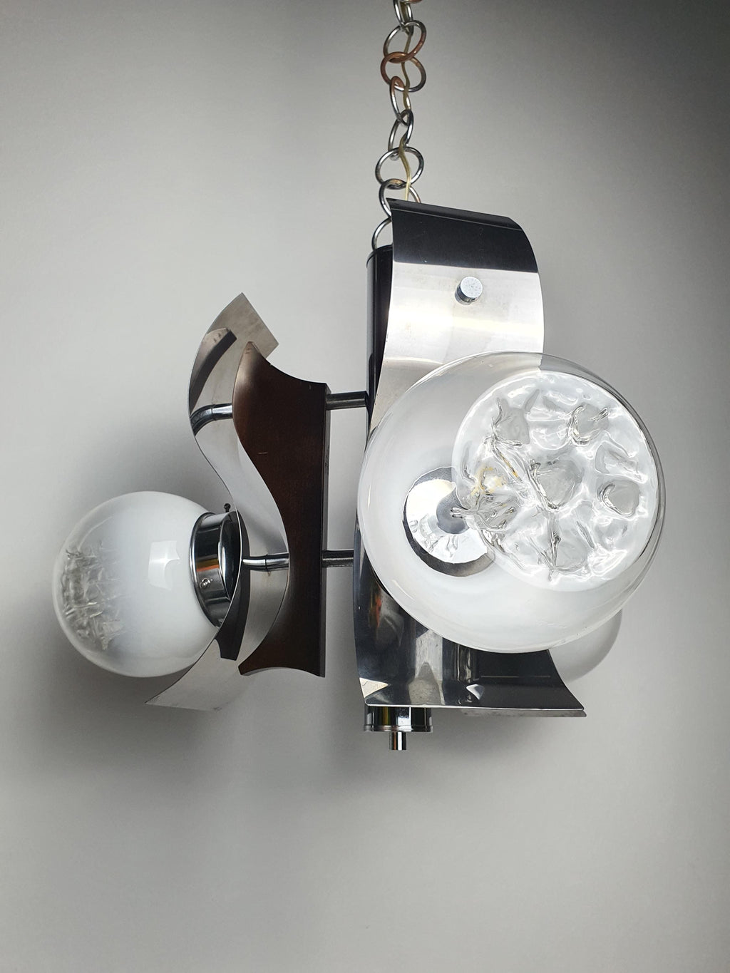 Underside view of vintage Murano Mazzega-style chandelier, three E14 sockets, white-to-clear glass globes