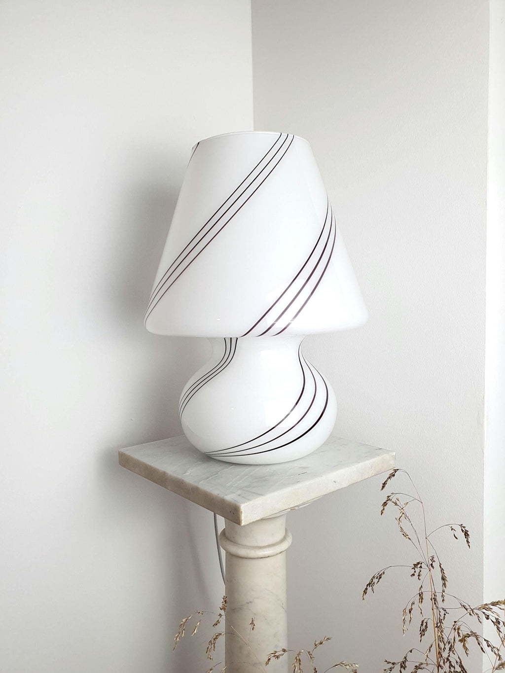 Vintage Murano glass mushroom table lamp with white base and black swirl lines, hand-blown Italian mid-century modern design