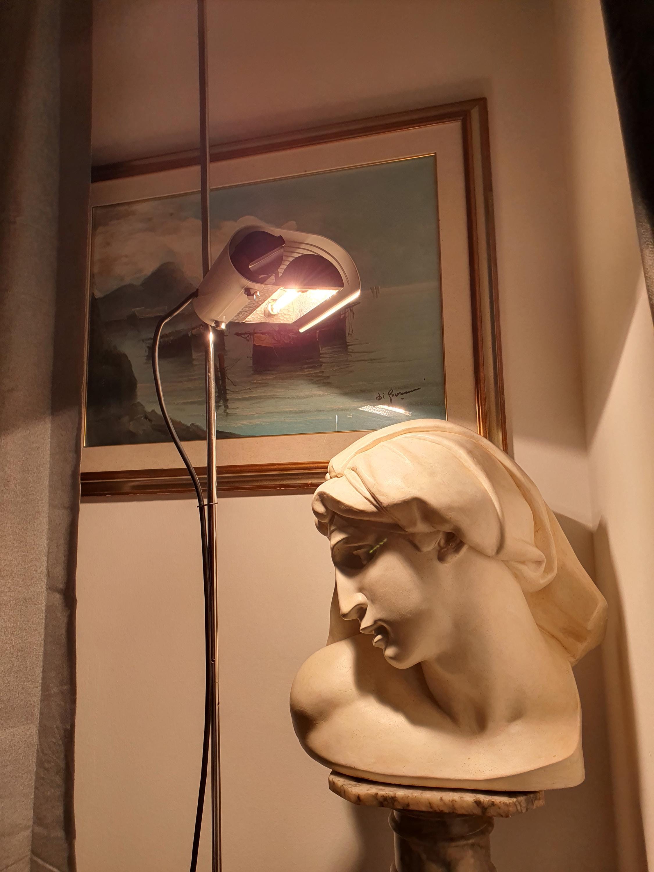 Joe Colombo Model 626 floor lamp unlit, showing chrome stem, U-shaped arm, and white visor silhouette