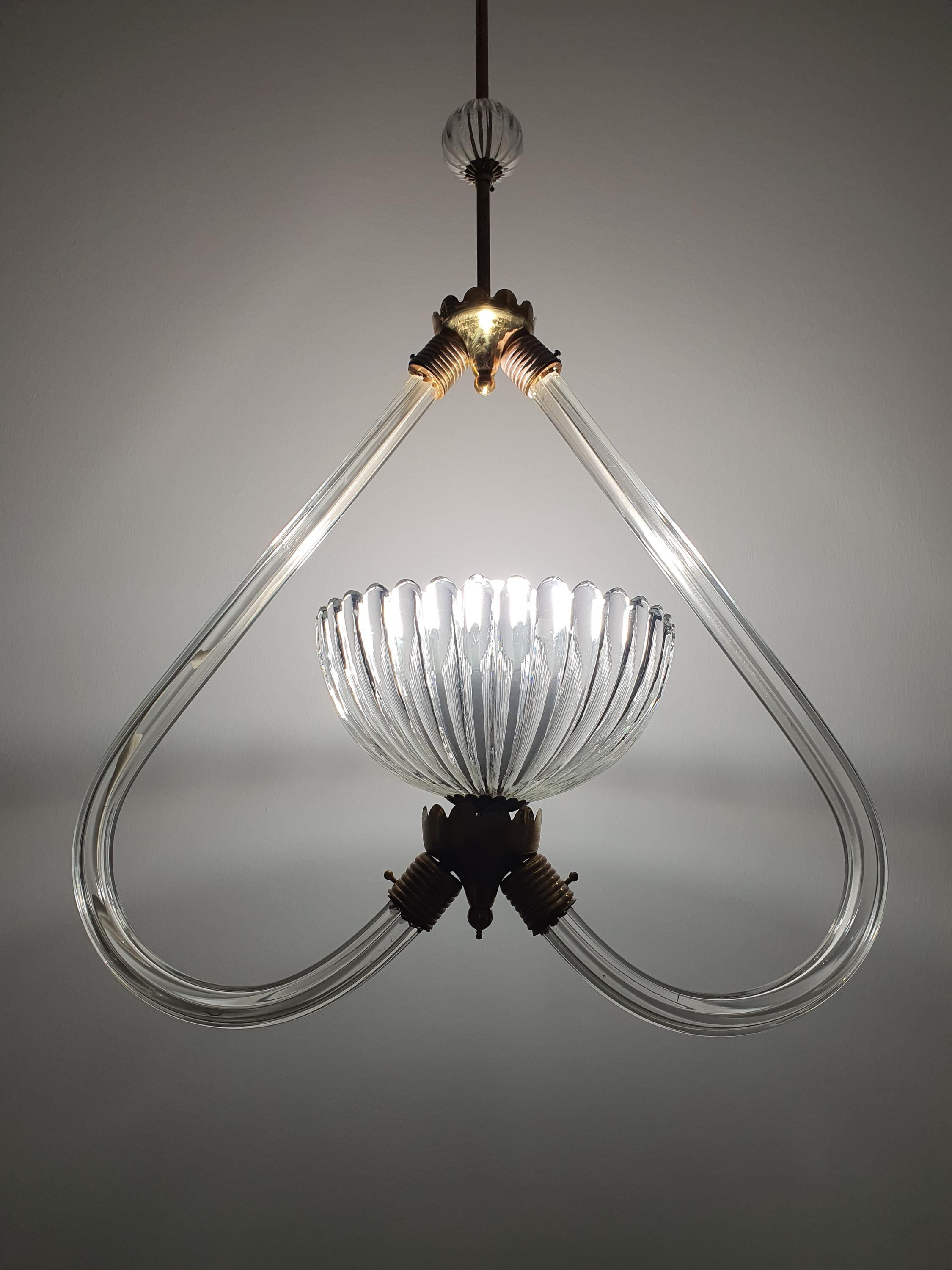 Murano glass heart-form pendant — clear glass floral detailing and brass contrast