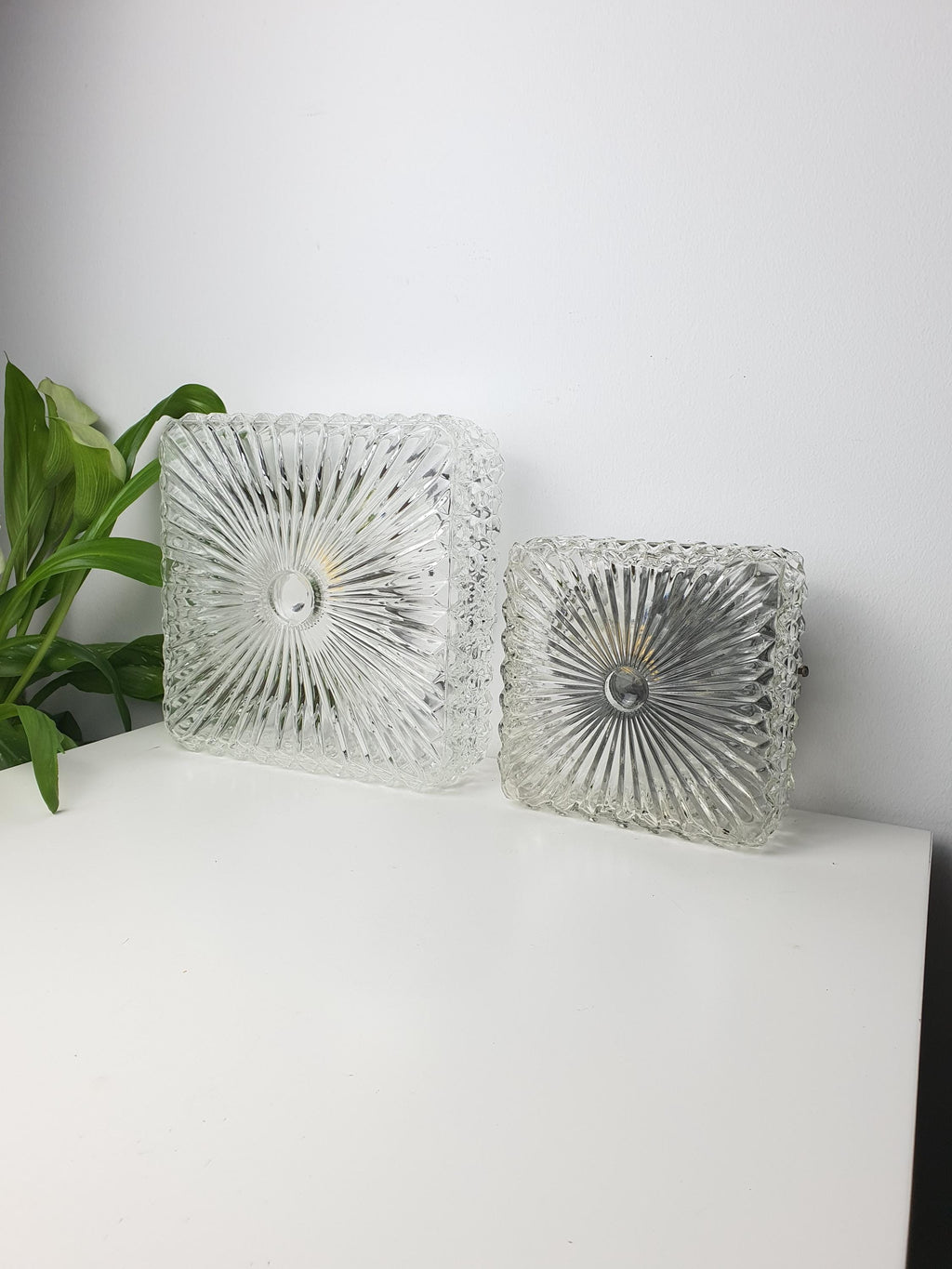 Set of 2 Brutalist MCM Midcentury wall sconces in stamped clear glass