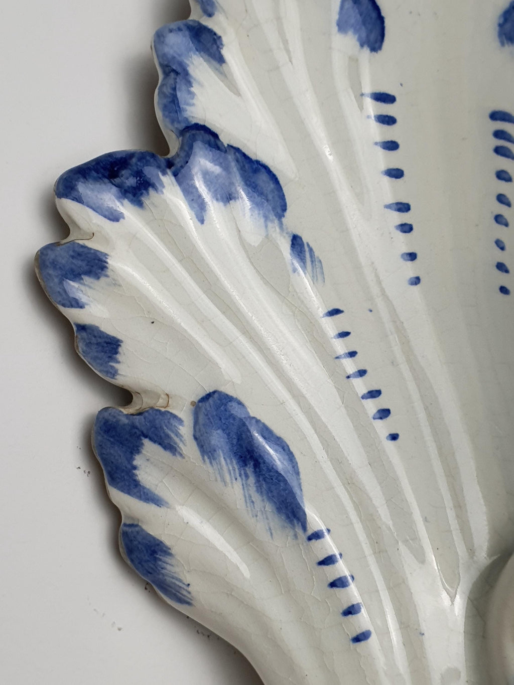 Hand-painted blue detail and white glaze contrast on vintage Italian Bassano ceramic wall sconce, 1970s–1980s Veneto