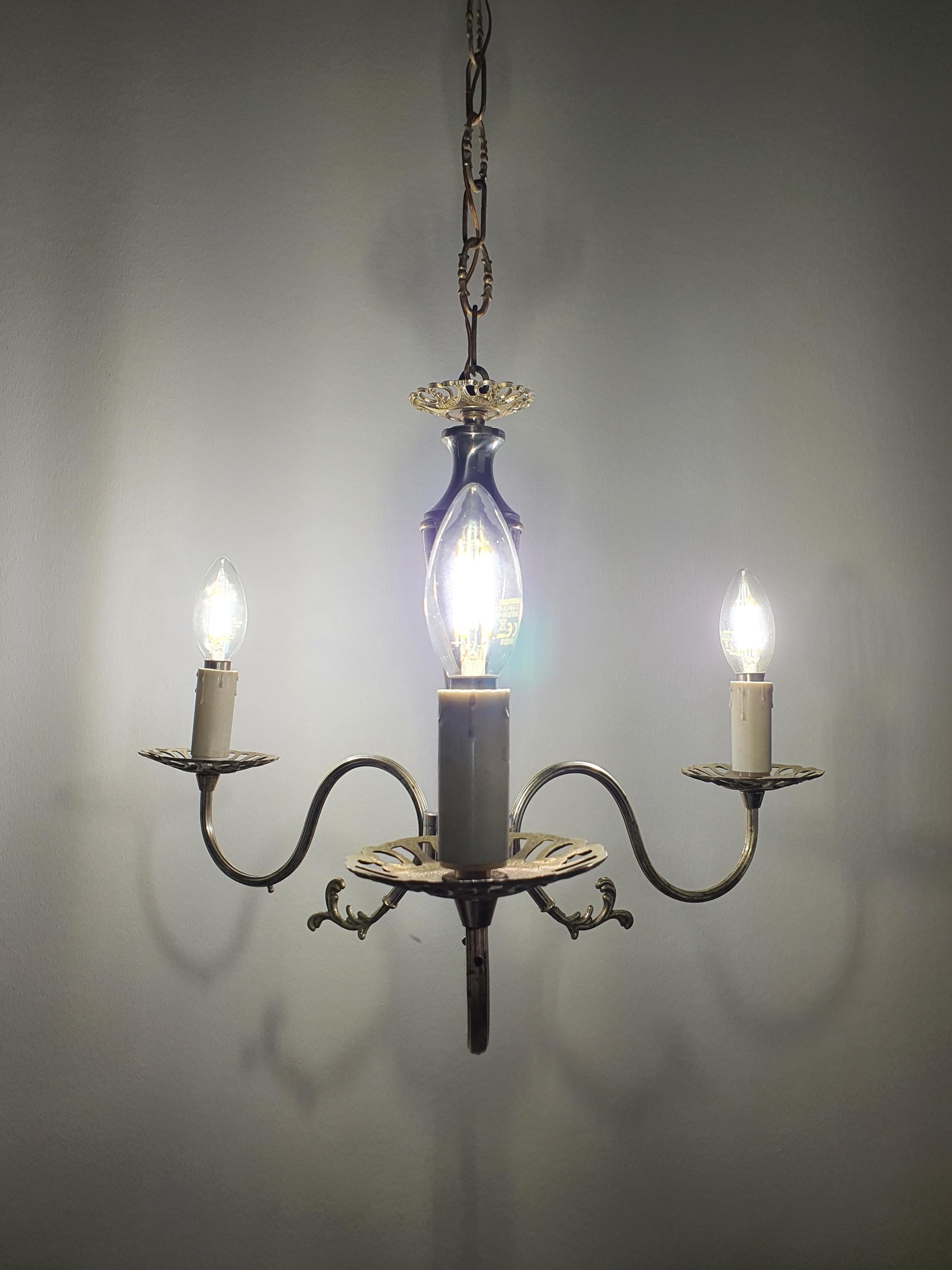 Vintage Italian 3-arm chandelier lit, warm candlelight glow, silver patina, compact Victorian design