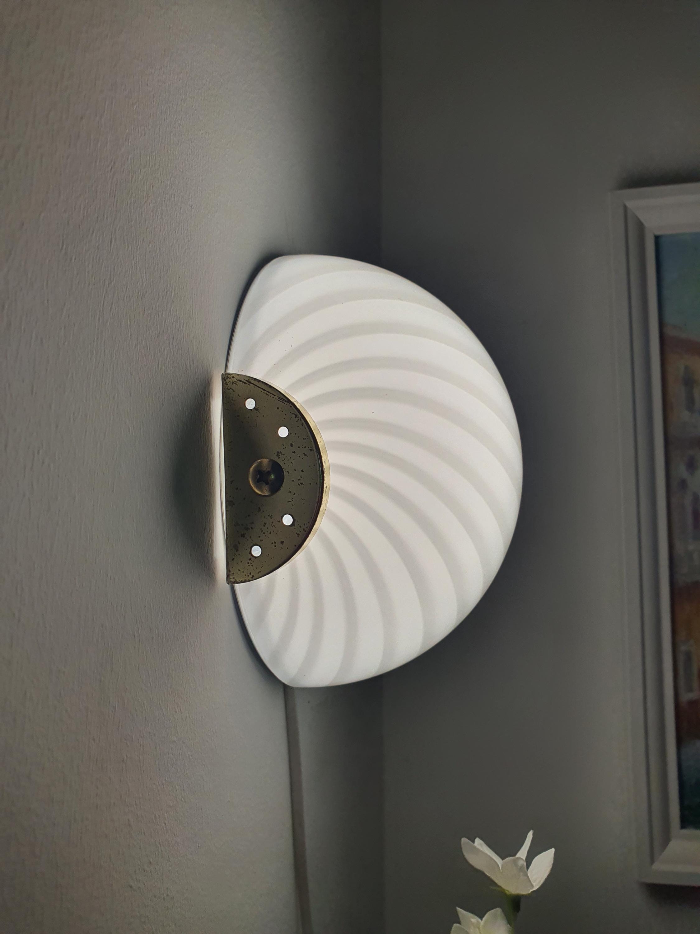 Murano glass flush mount light unlit, showing glass texture and brass-toned metal fitting
