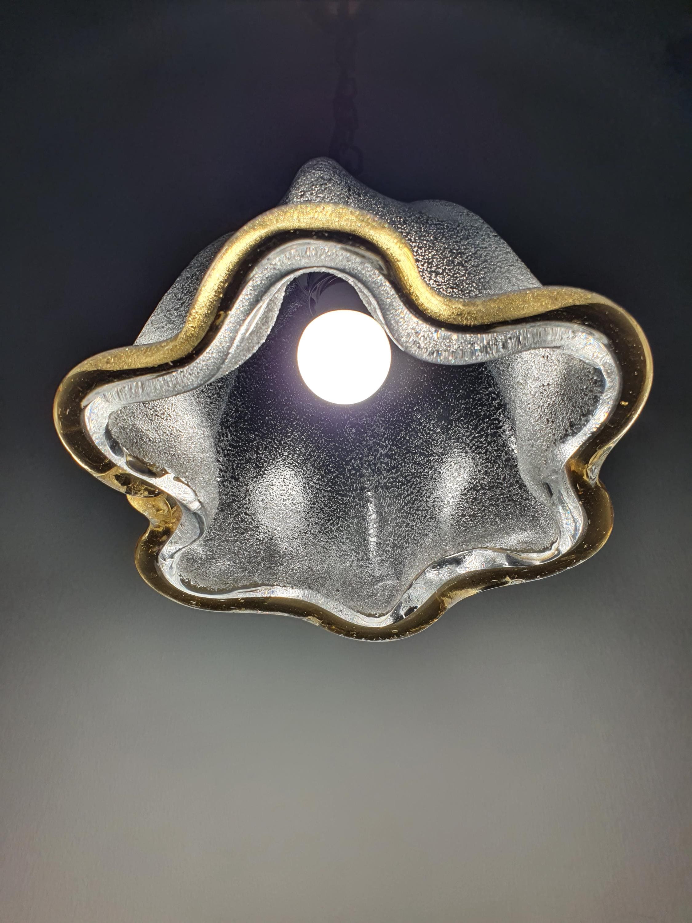 Vintage Murano bell tulip pendant unlit, showing graniglia icy interior, smooth glossy exterior and yellow rim silhouette