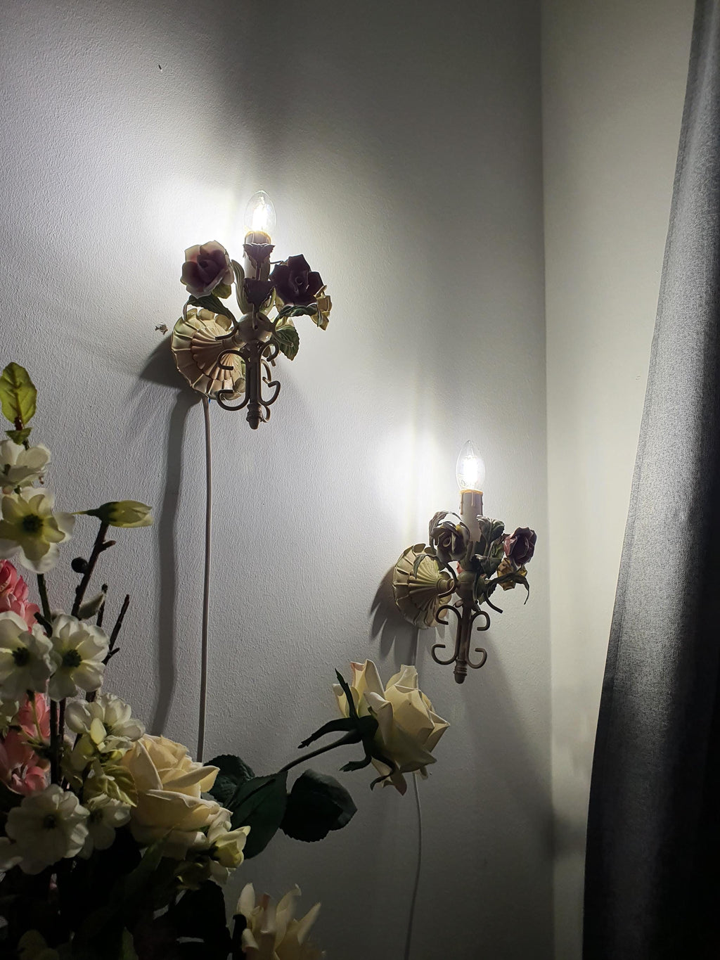 1950s Italian tole sconce — porcelain roses and curved metal form, romantic style