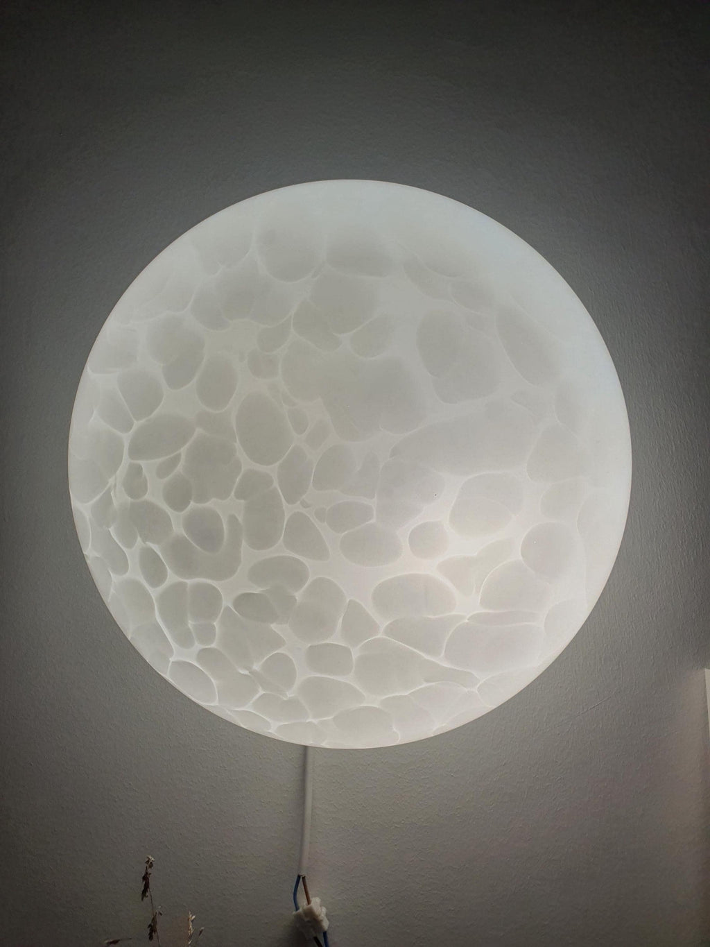 Detail of irregular white spot pattern in layered Murano glass, vintage moonstone flush mount shade