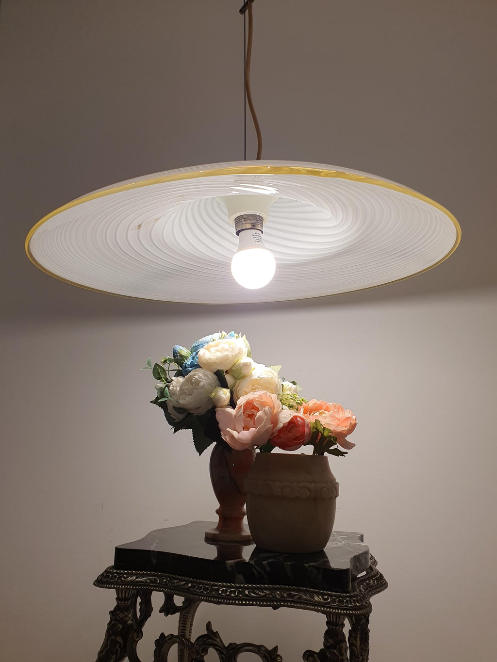 Murano white swirl pendant — wide shallow disc form, W56×H15cm, kitchen table setting