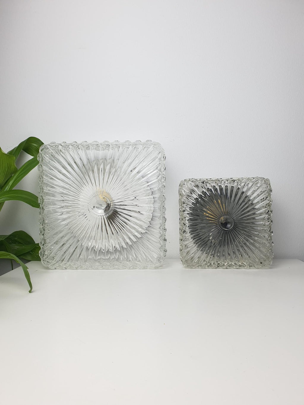 Set of 2 Brutalist MCM Midcentury wall sconces in stamped clear glass