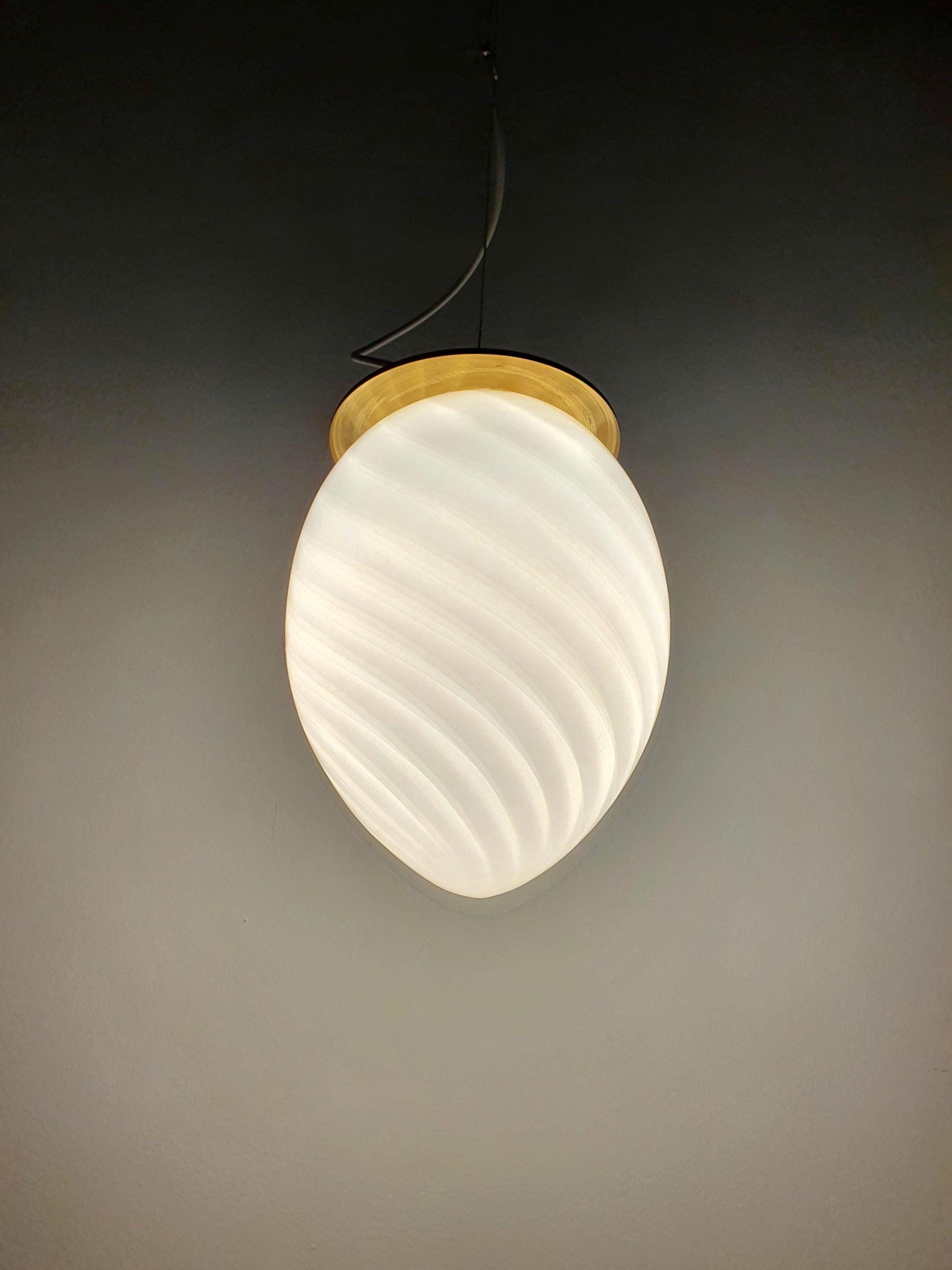 Vintage Murano glass egg pendant, white swirl decoration within the glass, brass fittings, Scandinavian MCM, Italy 1960s–1970s