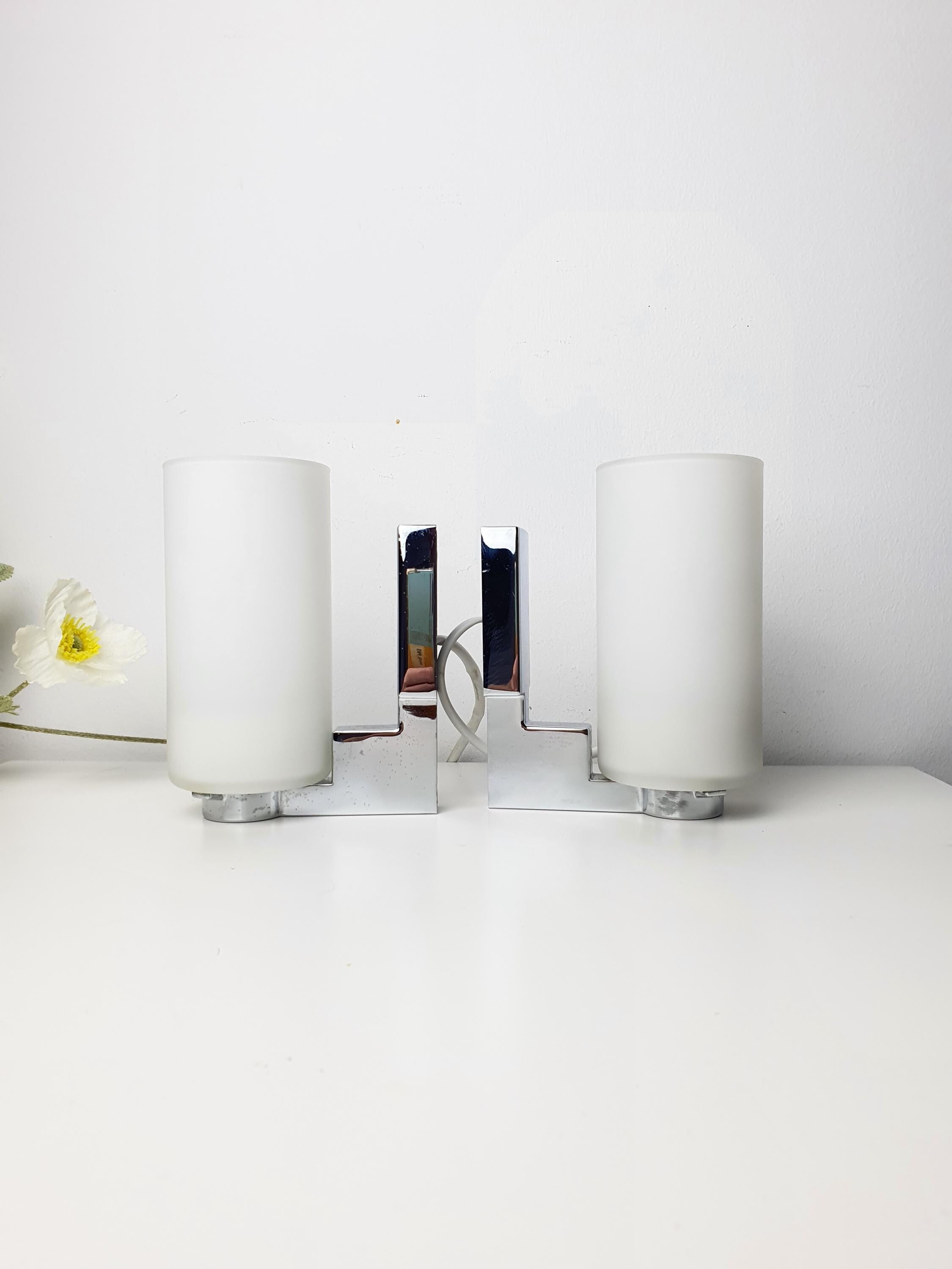 INDA Divo wall sconce — satin glass diffuser and chrome structure detail