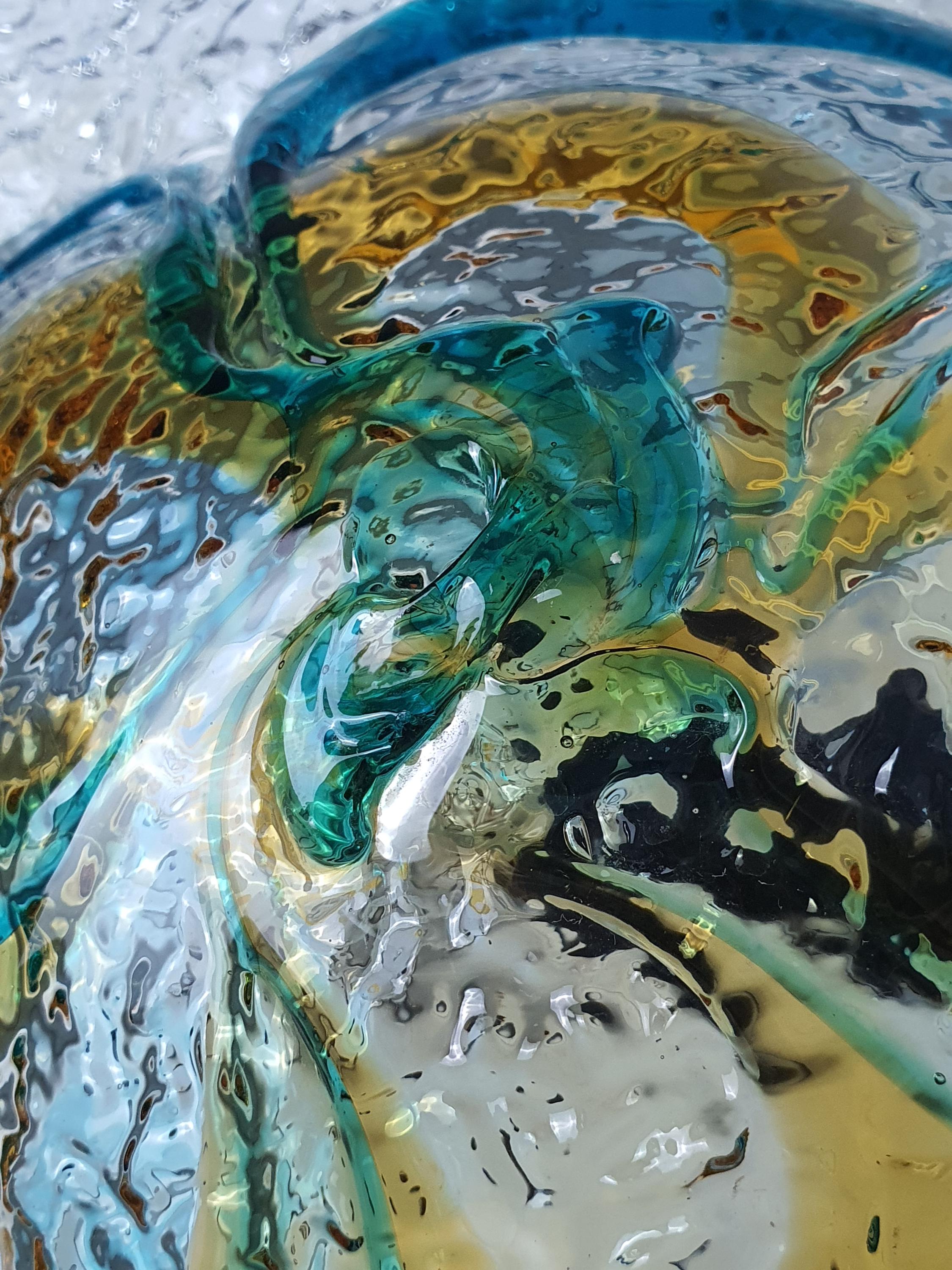 Close-up of thick irregular turquoise blue and caramel amber Murano glass petals, vintage Mazzega floral sconce