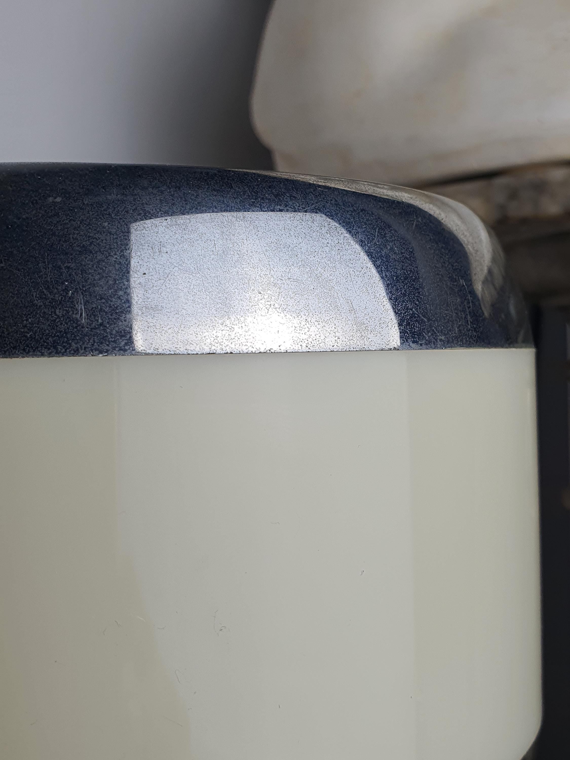 Close-up of opalescent PMMA diffuser on vintage 1970s Italian Space Age table lamp, soft ambient glowing plastic detail
