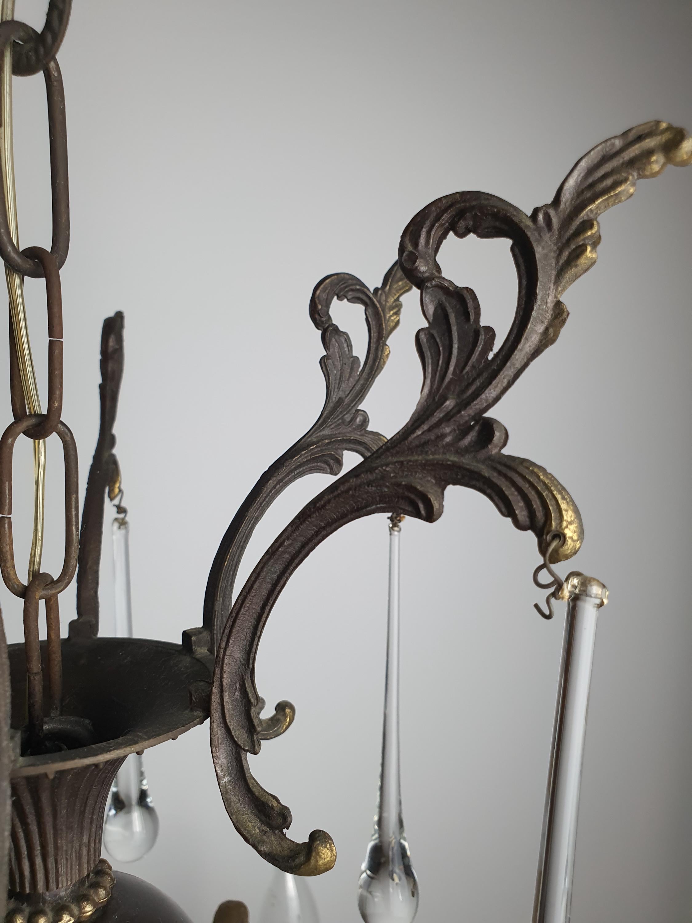 Vintage Italian brass Murano teardrop chandelier side profile, showing 74cm height, cascading clear glass drops, scrolling arms