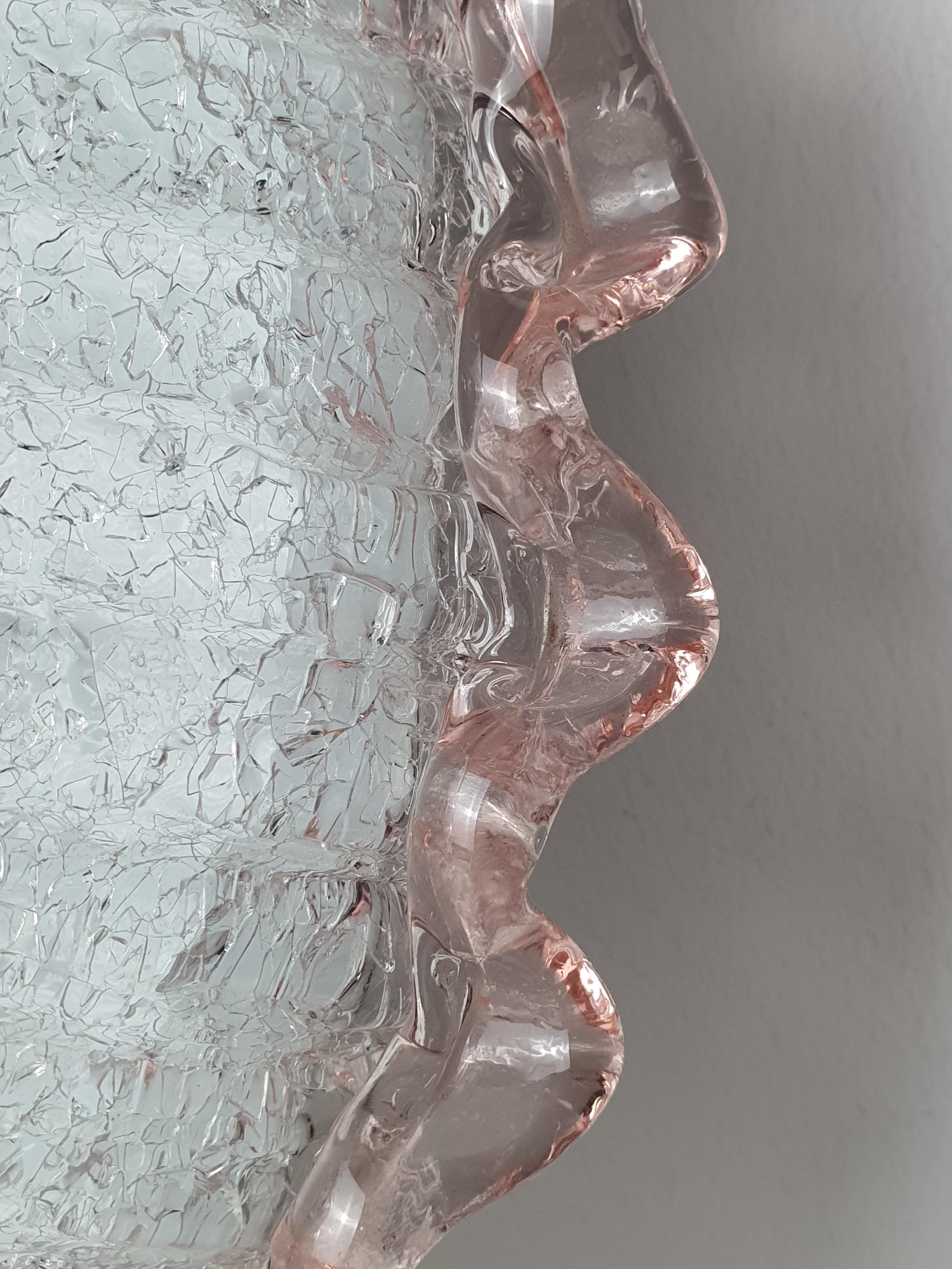 Close-up of frosted shell relief pattern and pink accent rim on vintage Murano glass floral flush mount