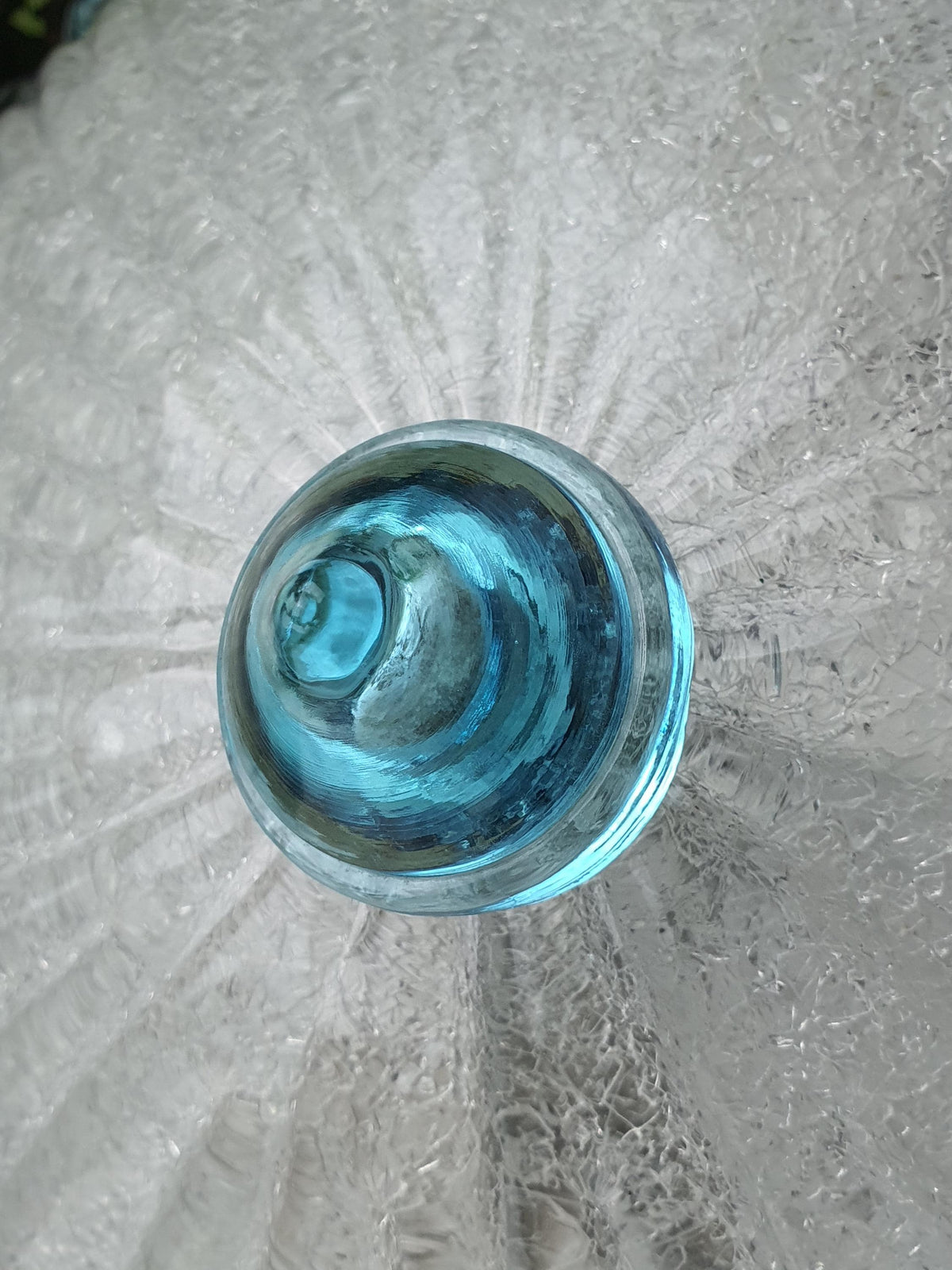 Central cone-shaped glass diffuser on a vintage Murano flush mount

