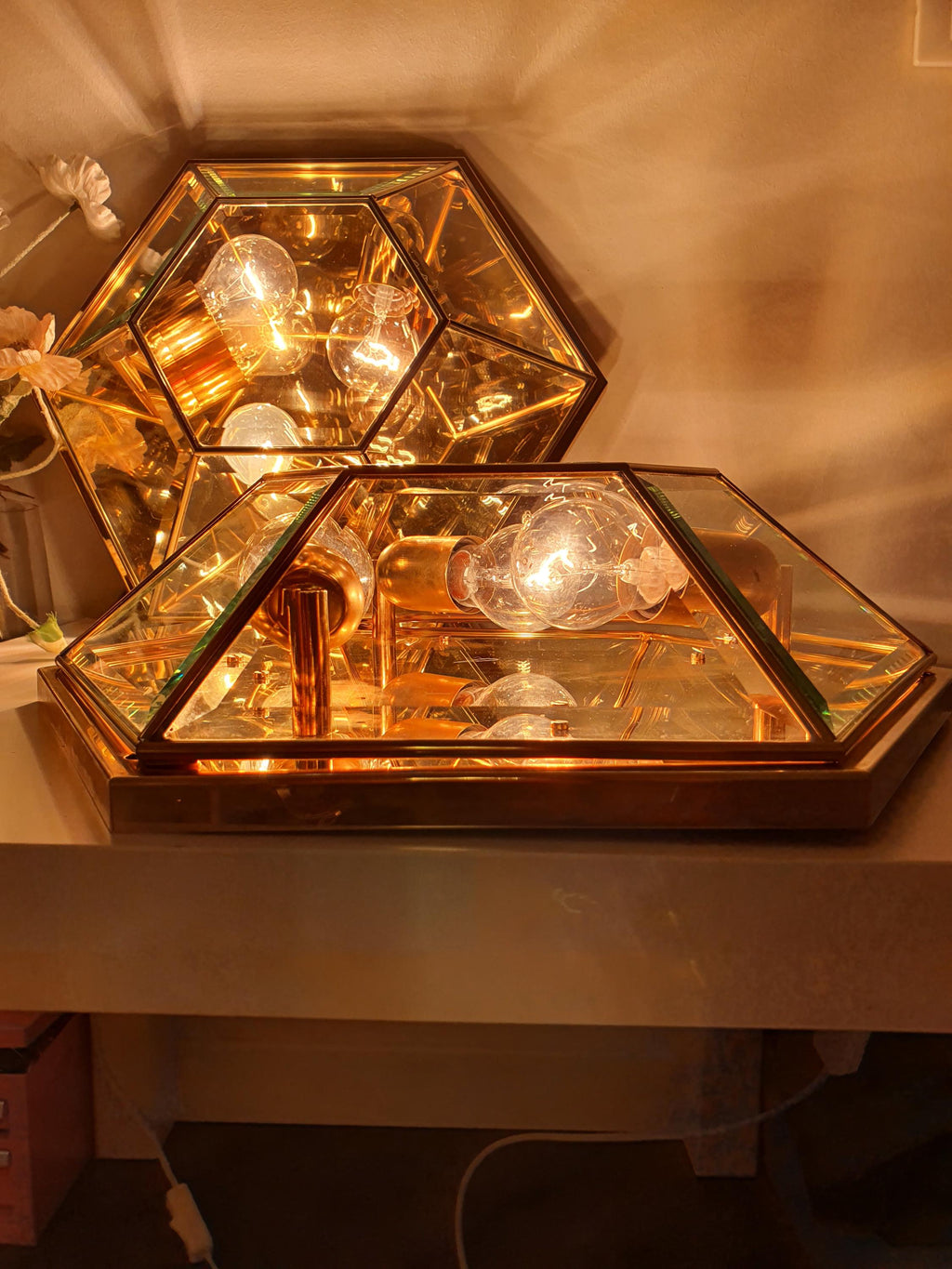 Vintage Italian hexagonal mirror glass light unlit, showing faceted mirrored panel geometry and gold-toned detail