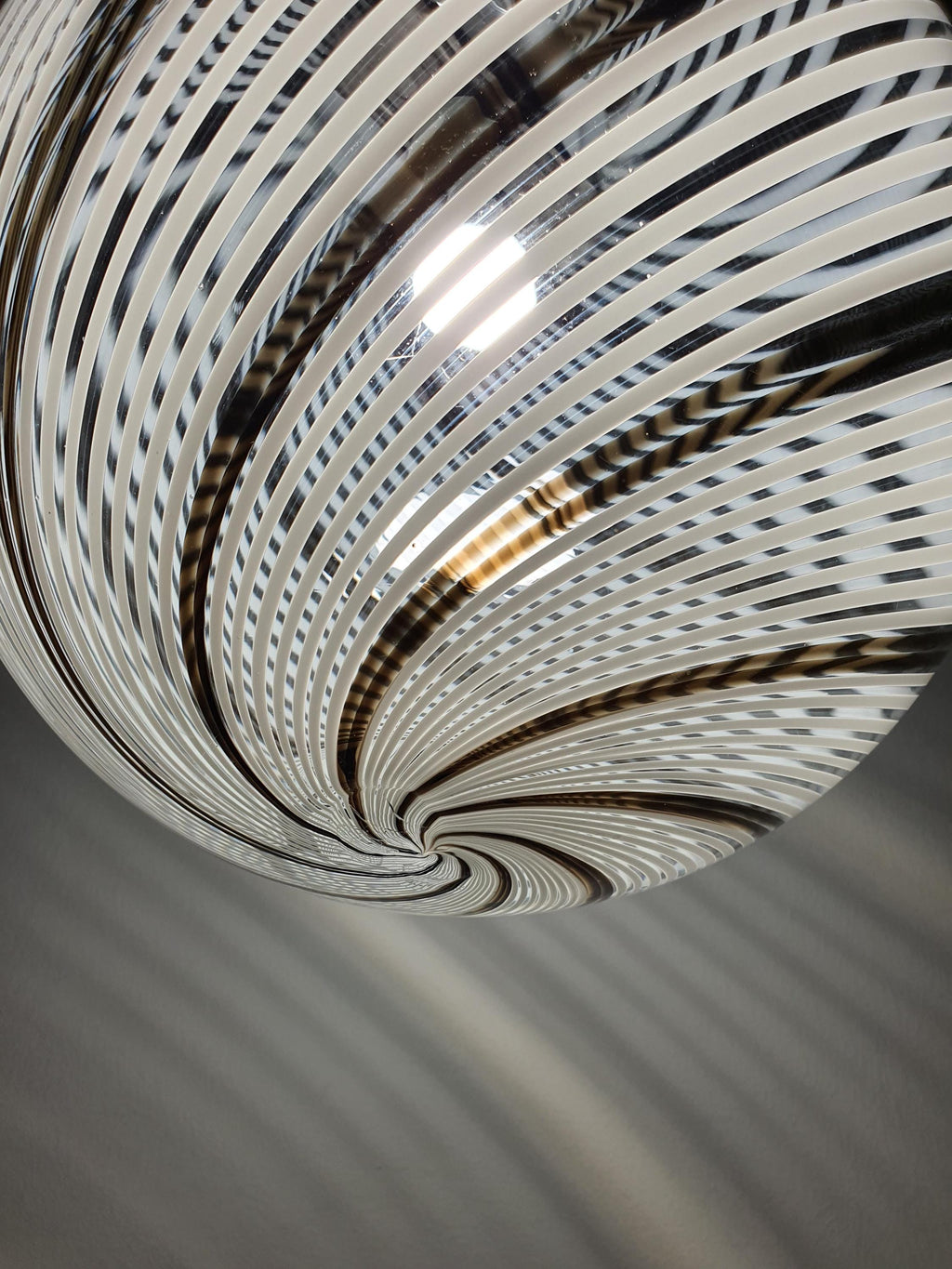 Underside view of Murano glass filigrana globe pendant, E27 socket, chrome ring