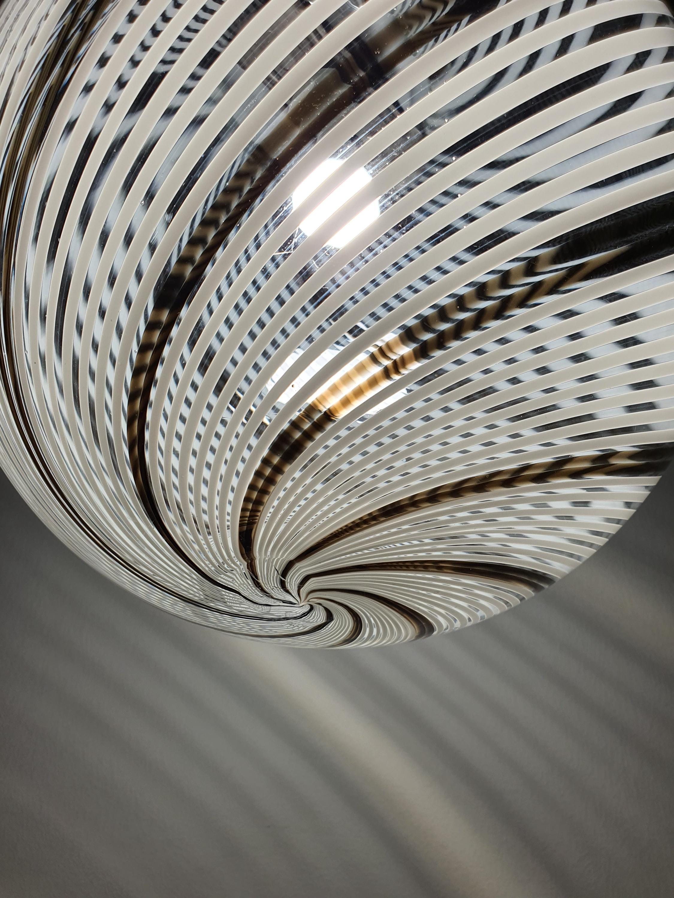 Underside view of Murano glass filigrana globe pendant, E27 socket, chrome ring
