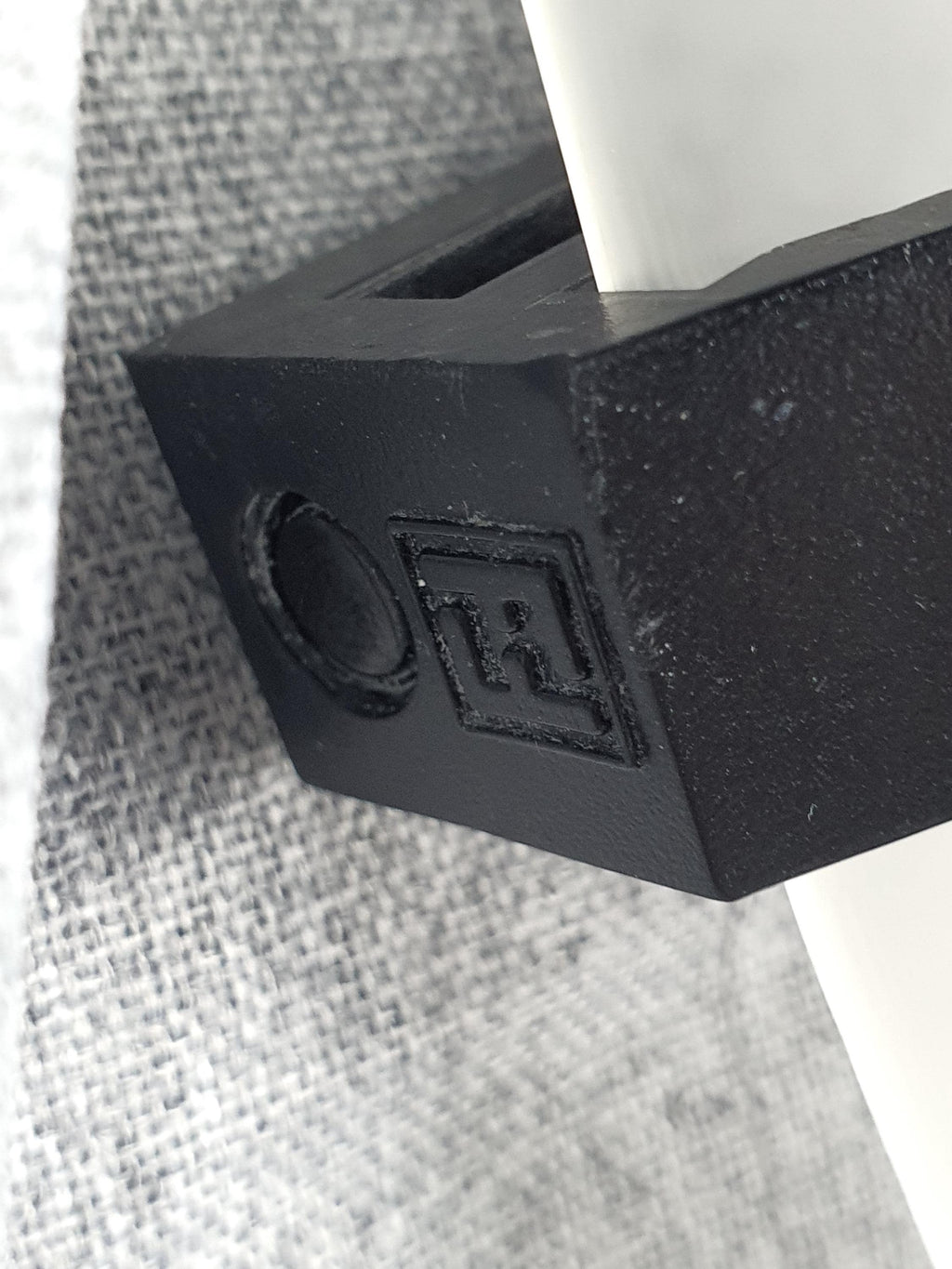 F. Fabbian vintage pyramid light — black metal elements and frosted glass contrast, close-up