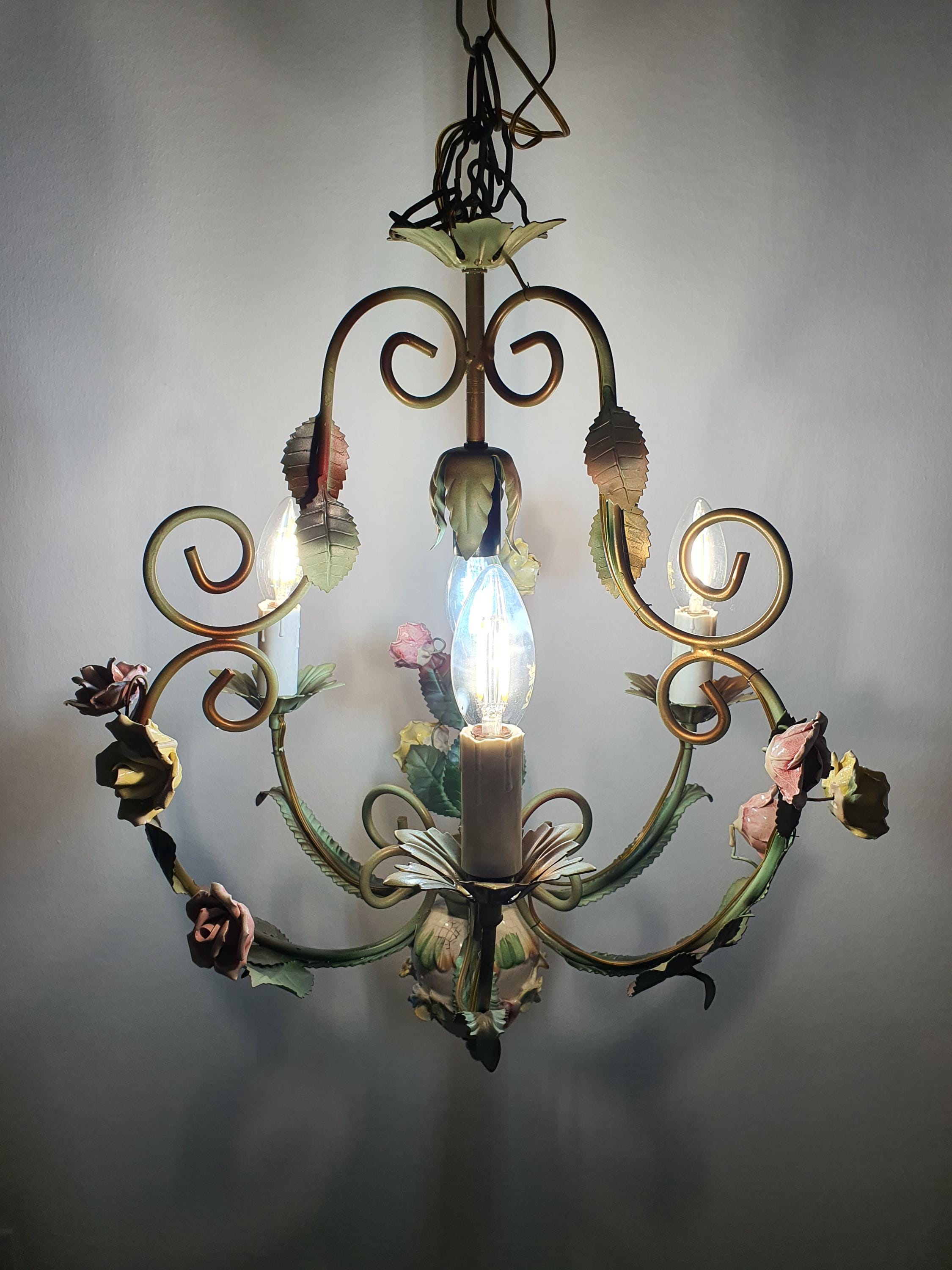 Vintage Italian cottage chandelier unlit, showing green painted metal and porcelain flowers