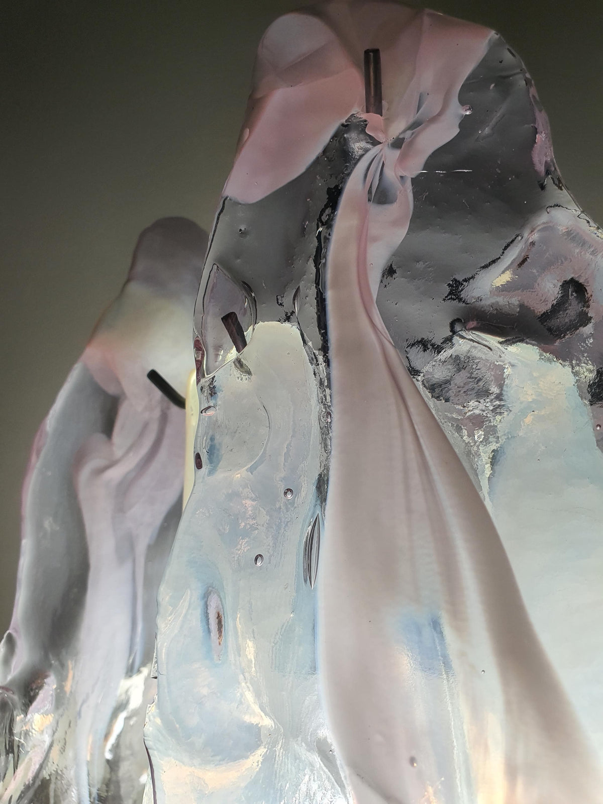 Thicker clear glass petal with soft lilac tones and white spots
