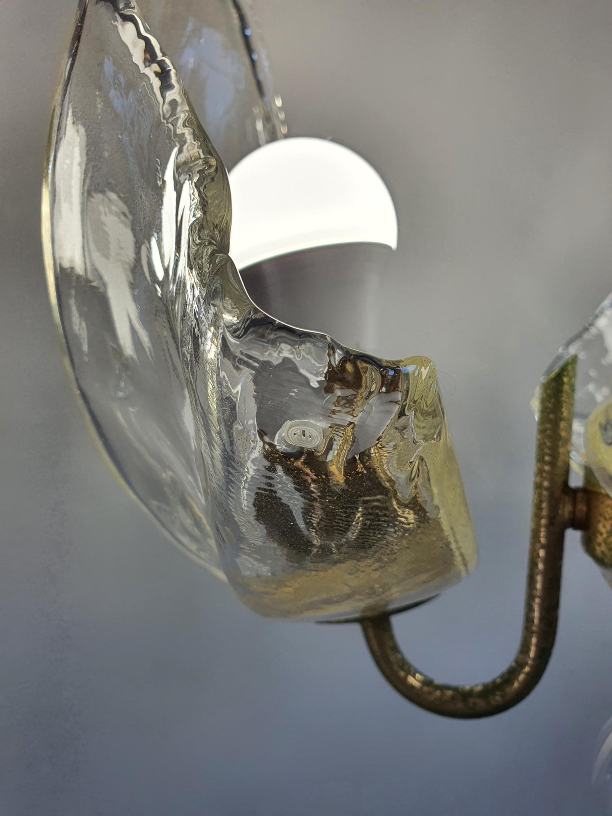 Handcrafted floral glass petal on a vintage La Murrina chandelier
