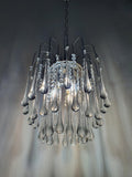 Vintage Murano clear teardrop cascade chandelier front view, faceted and smooth clear glass drops, chrome frame, waterfall silhouette