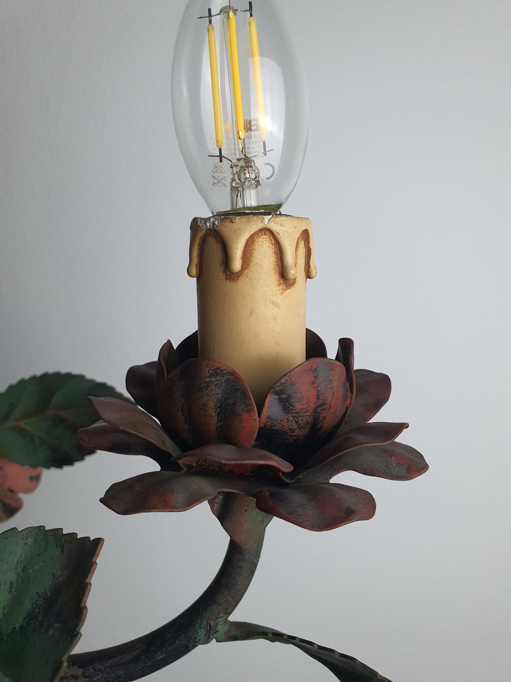 Rose-inspired painted metal bloom on a vintage Italian floral chandelier
