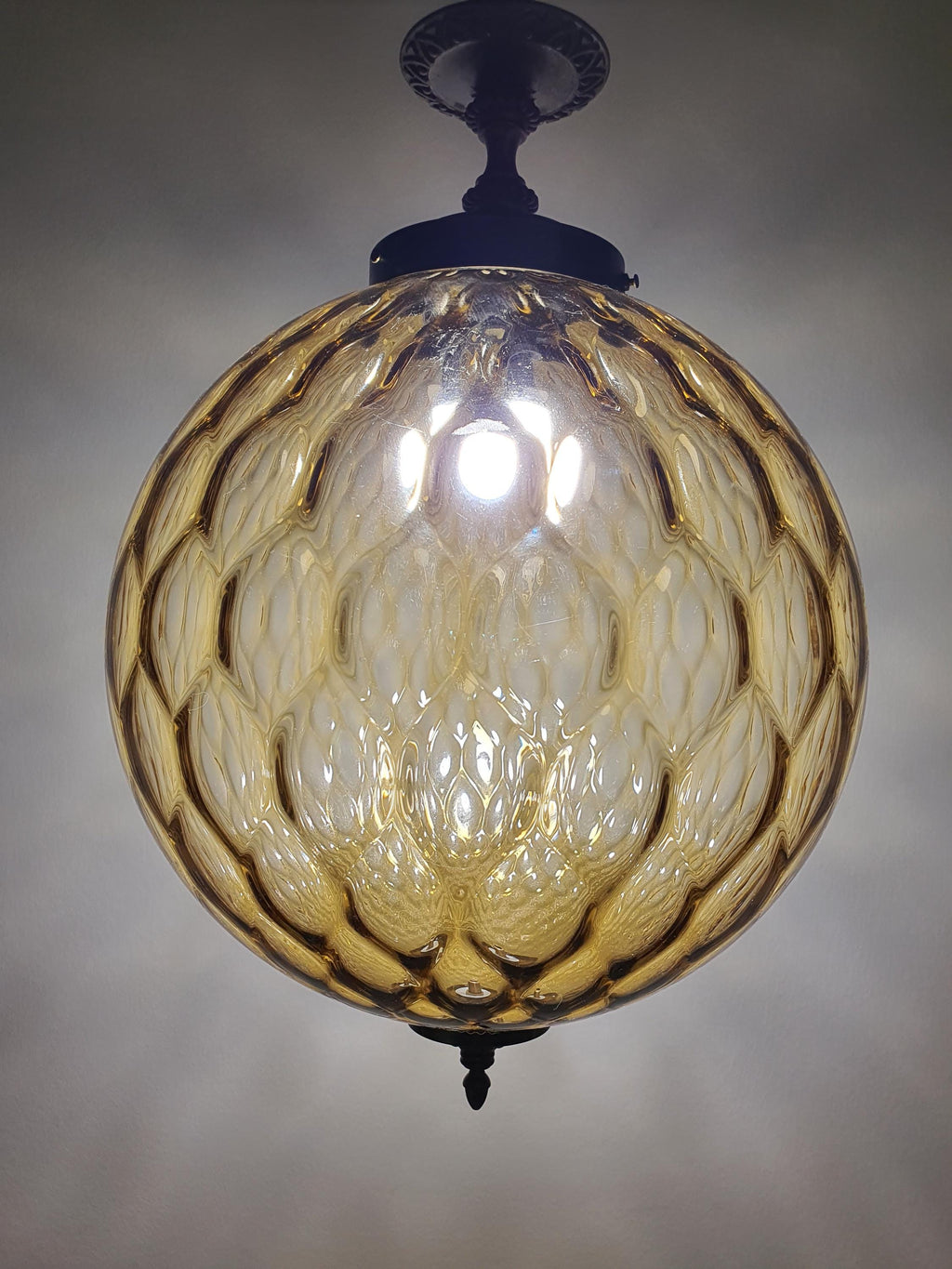 Vintage Murano glass pendant light installed in entryway, Art Deco style