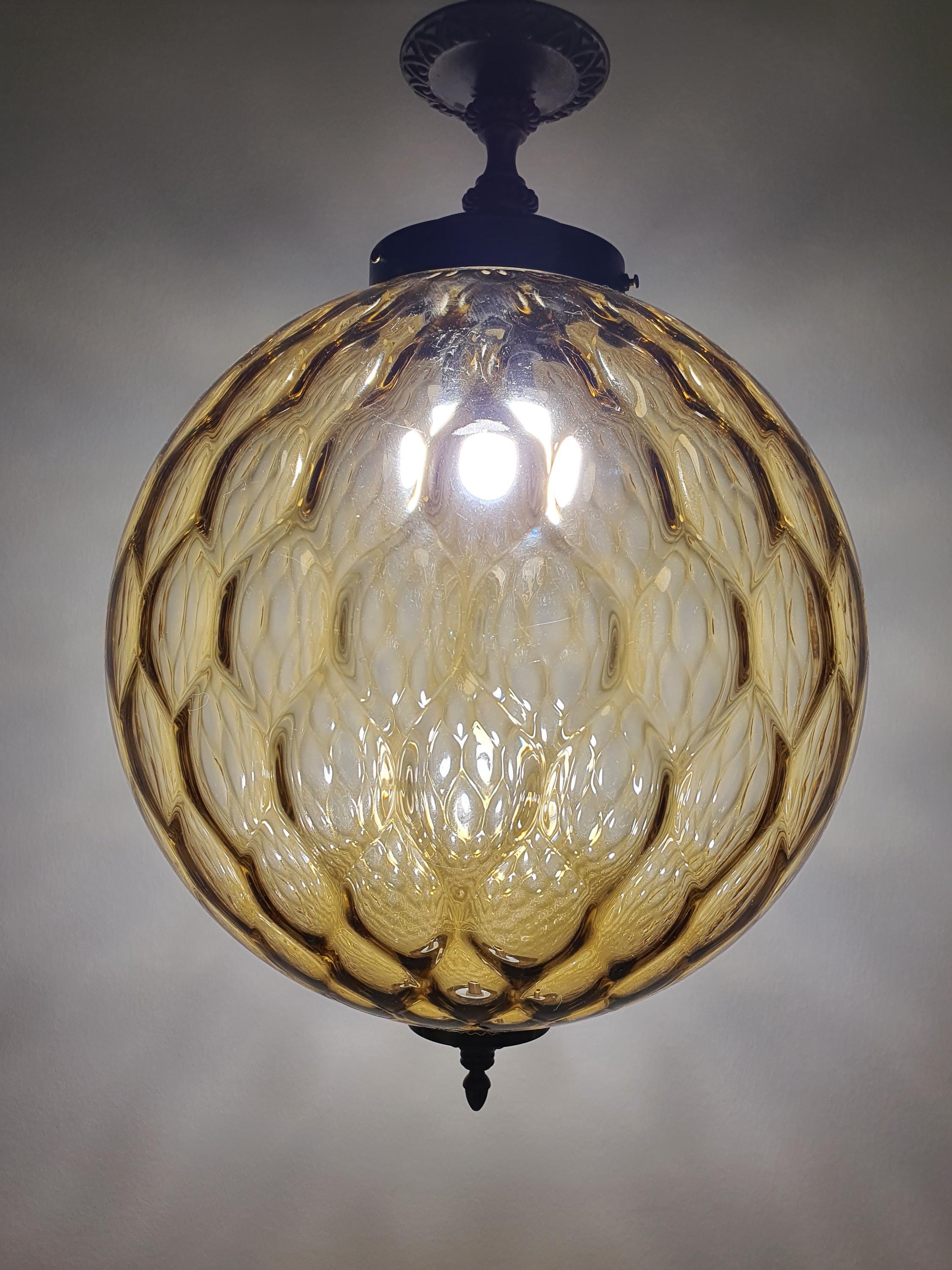 Vintage Murano glass pendant light installed in entryway, Art Deco style