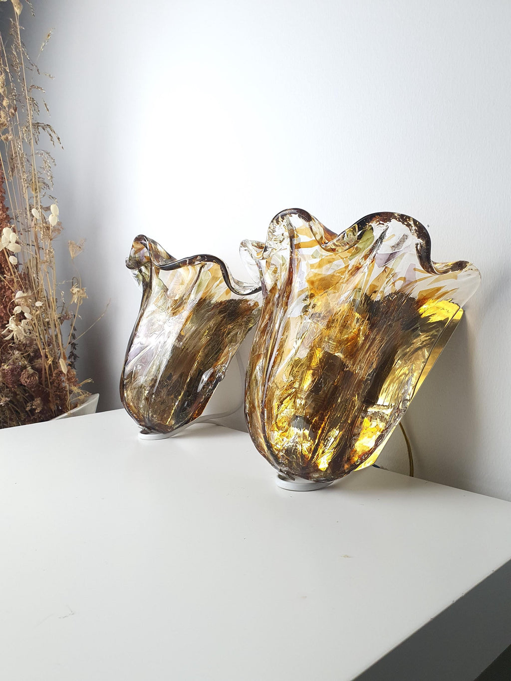Green glass accents within an autumn-coloured tulip shade
