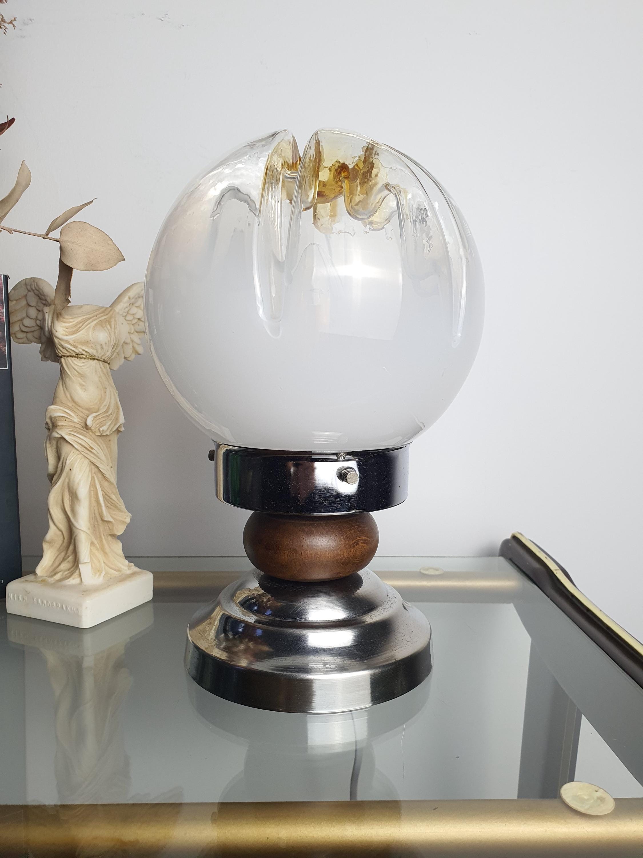 Amber crown accent detail on vintage Mazzega Murano white-to-clear gradient globe table lamp, 1970s Italy