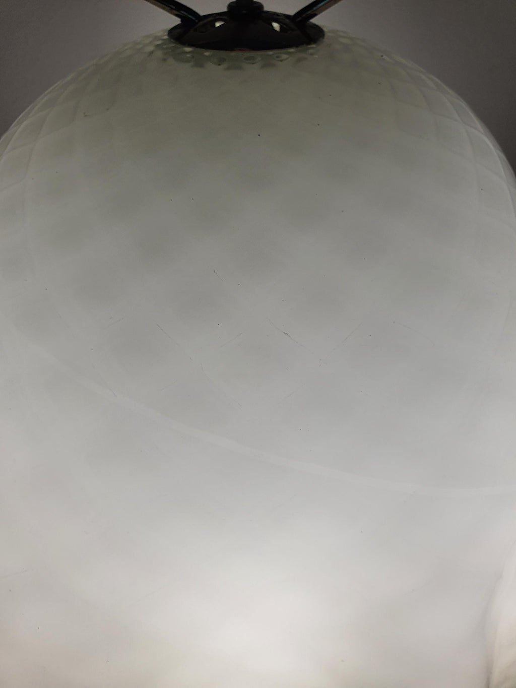 Honeycomb texture on a handcrafted green Murano glass pendant shade
