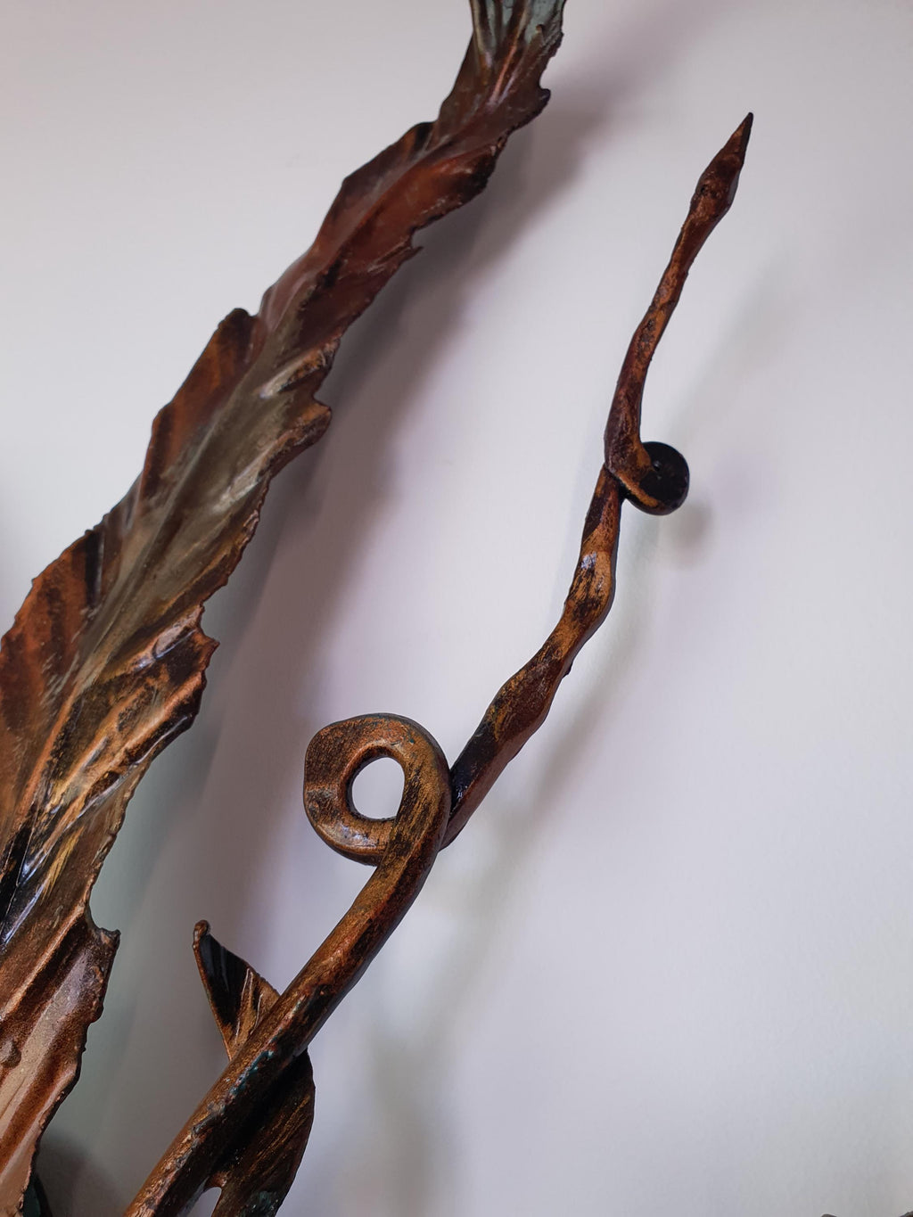 Layered leaf details on a large vintage gilded metal botanical light
