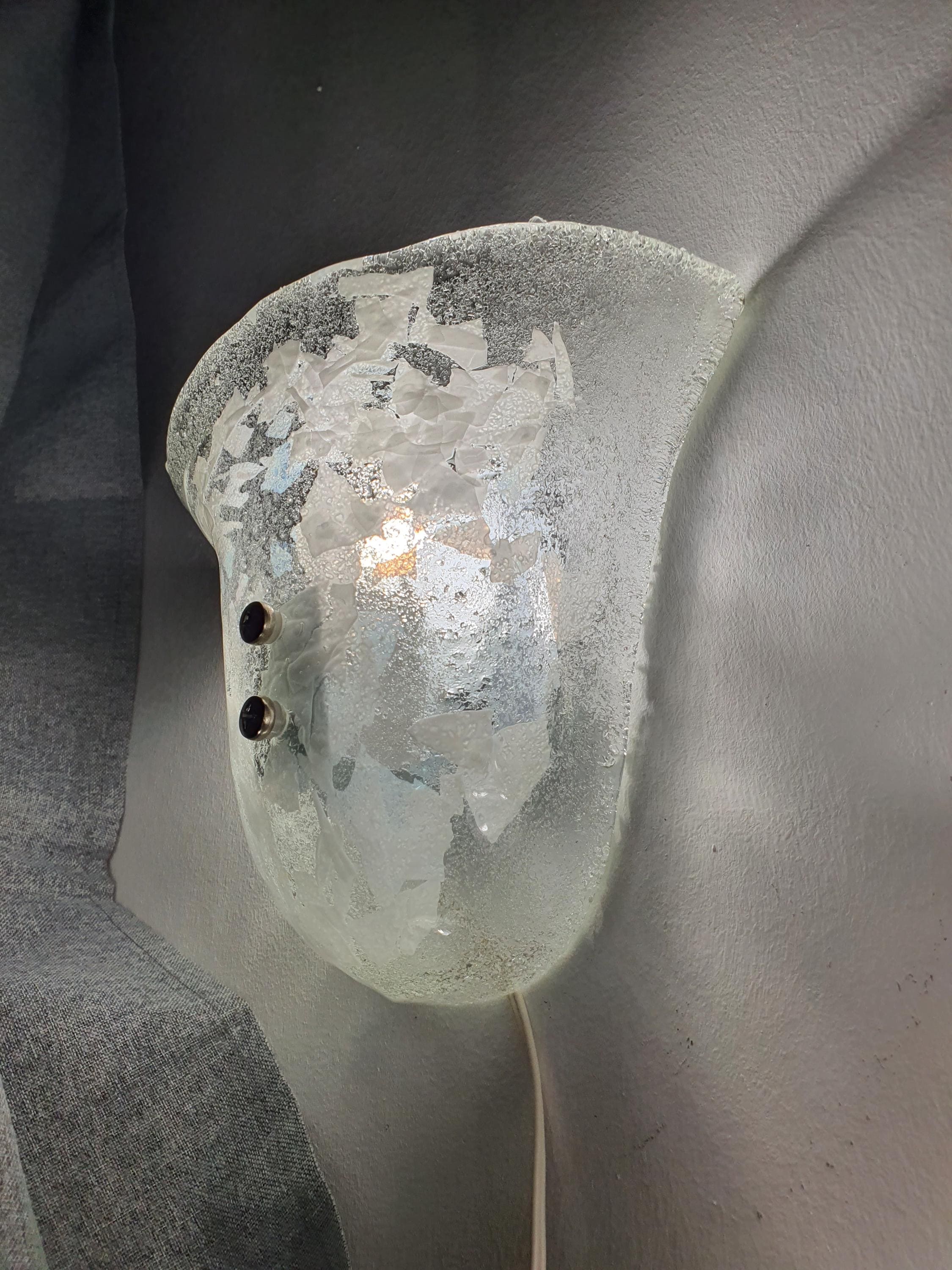 Set of 3 vintage Murano shell sconces installed in hallway, cohesive matching set, warm organic glow