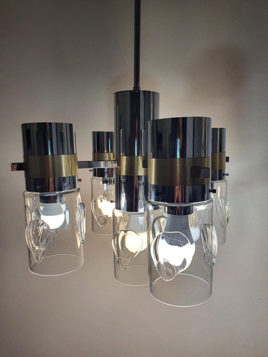 Vintage Space Age Sputnik chandelier in living room, sculptural five-arm chrome gold Sputnik, Sciolari style, Space Age MCM