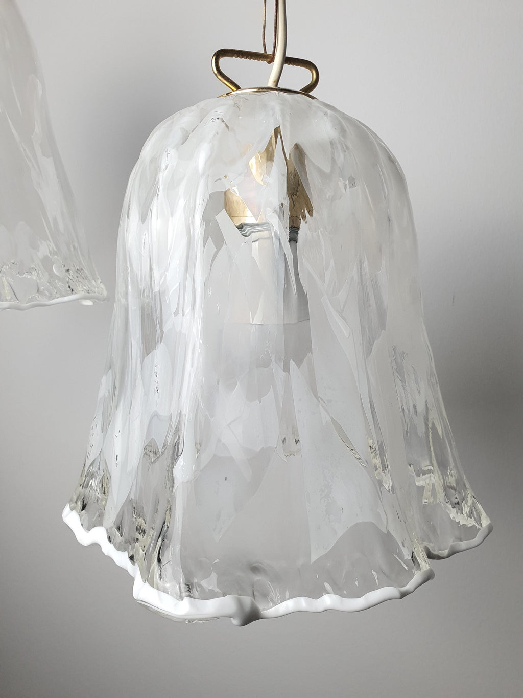 White and clear Murano glass Fazzoletto shades on a pair of vintage Italian pendant lights
