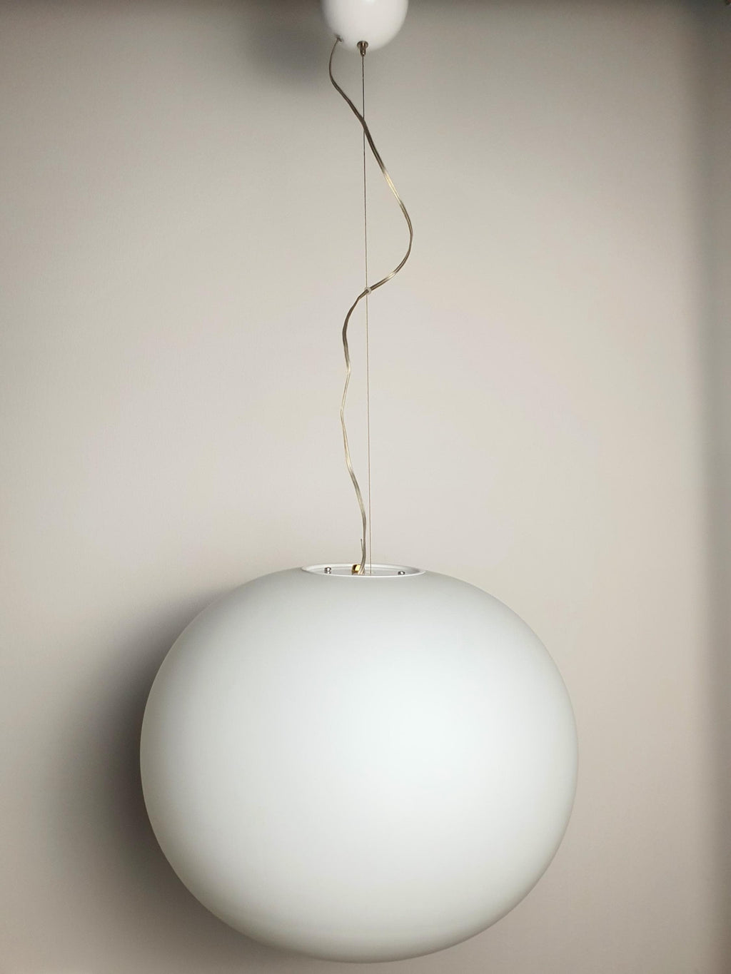 Vintage satin glass globe pendant — illuminated, soft moon-like warm glow