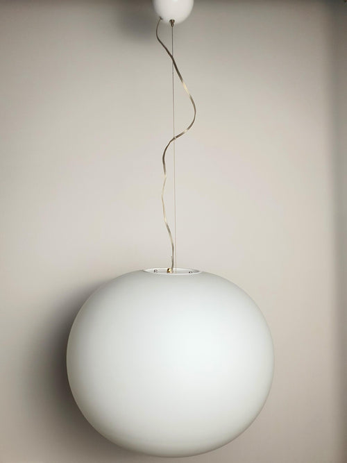 Vintage satin glass globe pendant — illuminated, soft moon-like warm glow